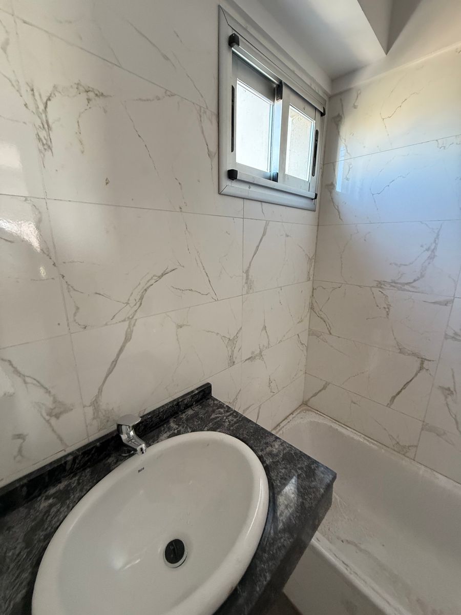 DEPARTAMENTO A ESTRENAR DE TRES AMBIENTES DE CATEGORIA CON COCHERA FINANCIACION — foto 12