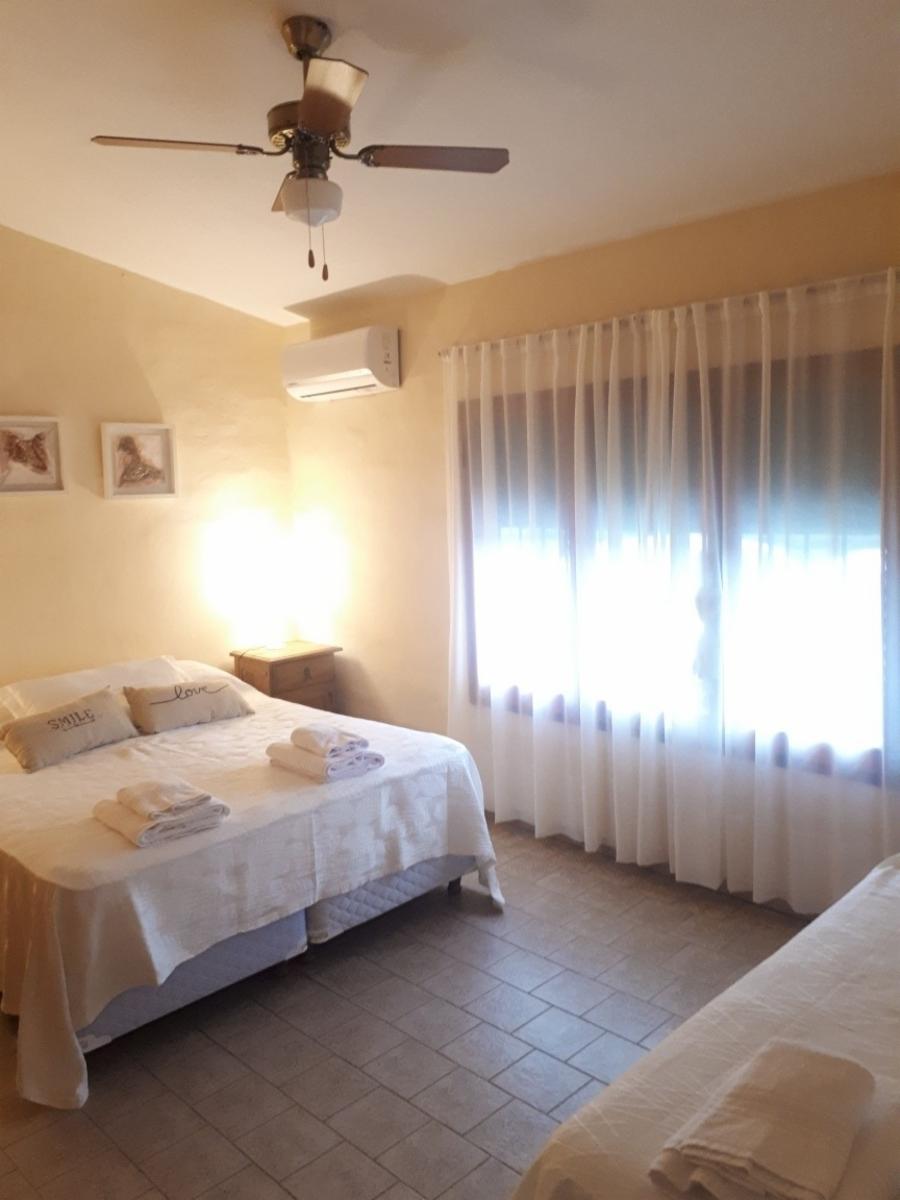 POTRERO DE GARAY, A 2 CUADRAS DEL LAGO CON PISCINA, CAPACIDAD HASTA 7 PERSONAS - 9