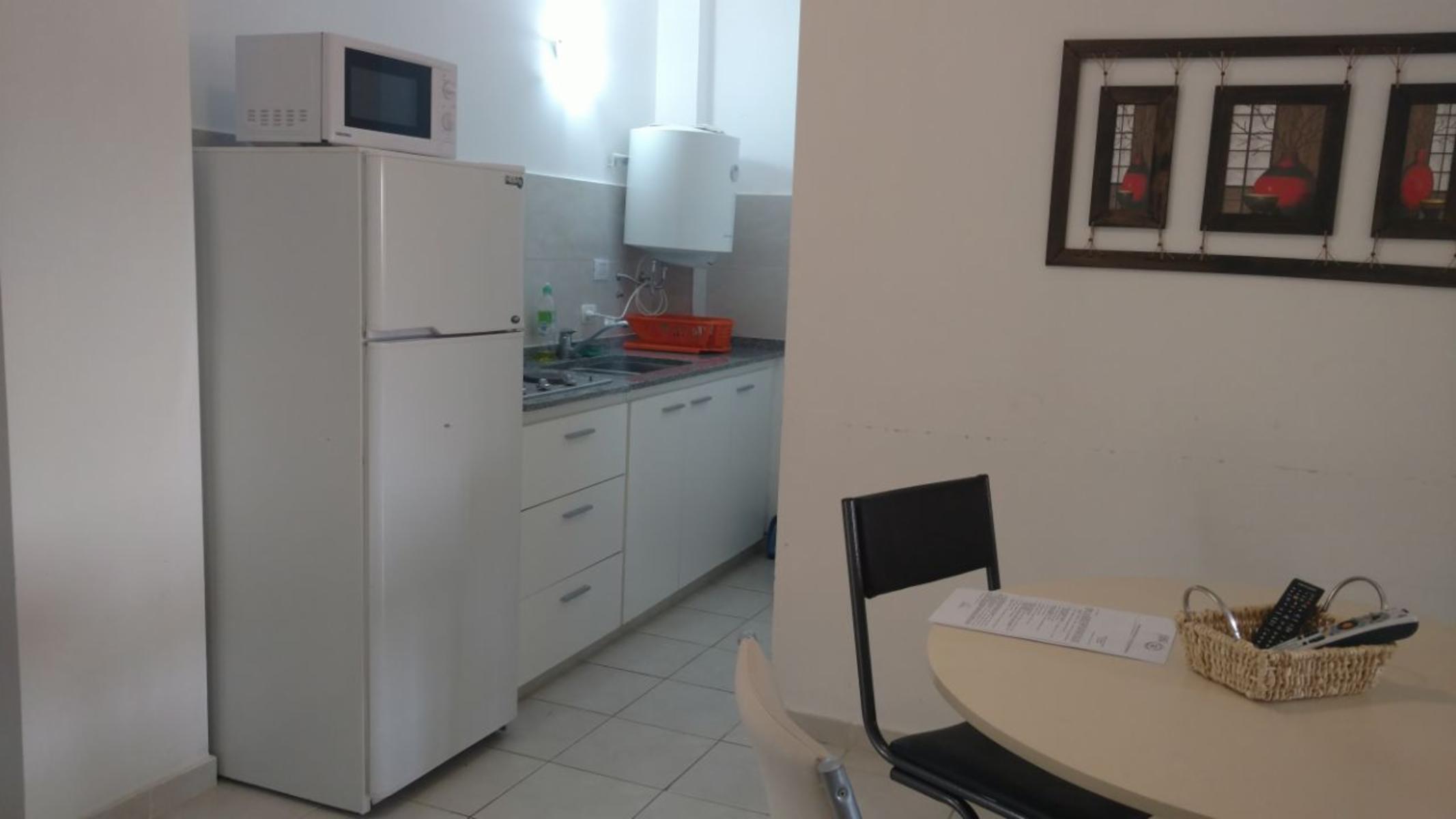 Departamento centrico 2 dormitorios, pileta y cochera — foto 2