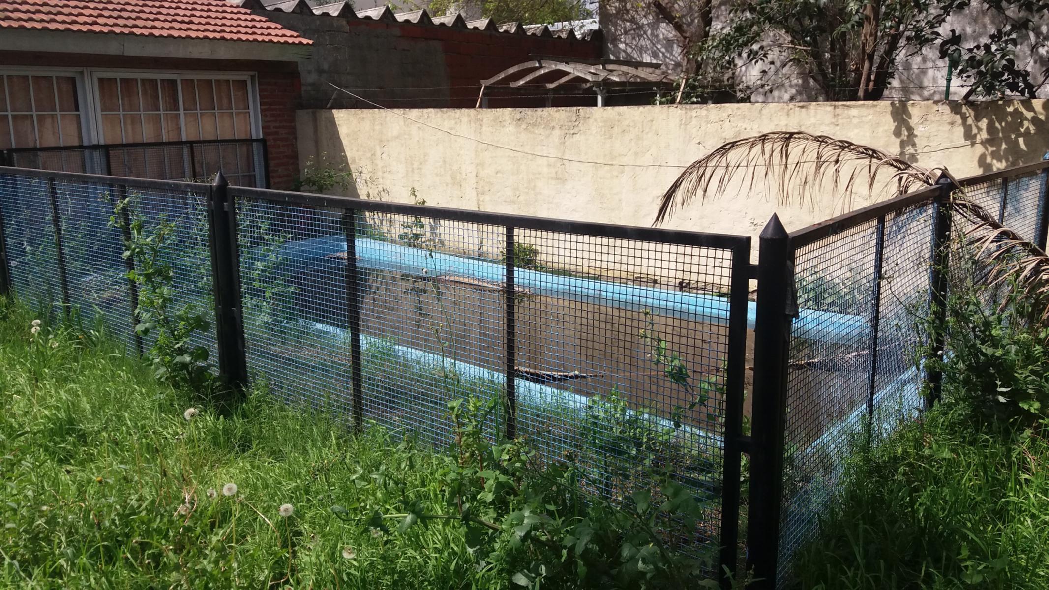 OPORTUNIDAD INVERSOR: 2 PH A RECICLAR CON FONDO, PISCINA Y QUINCHO — foto 5