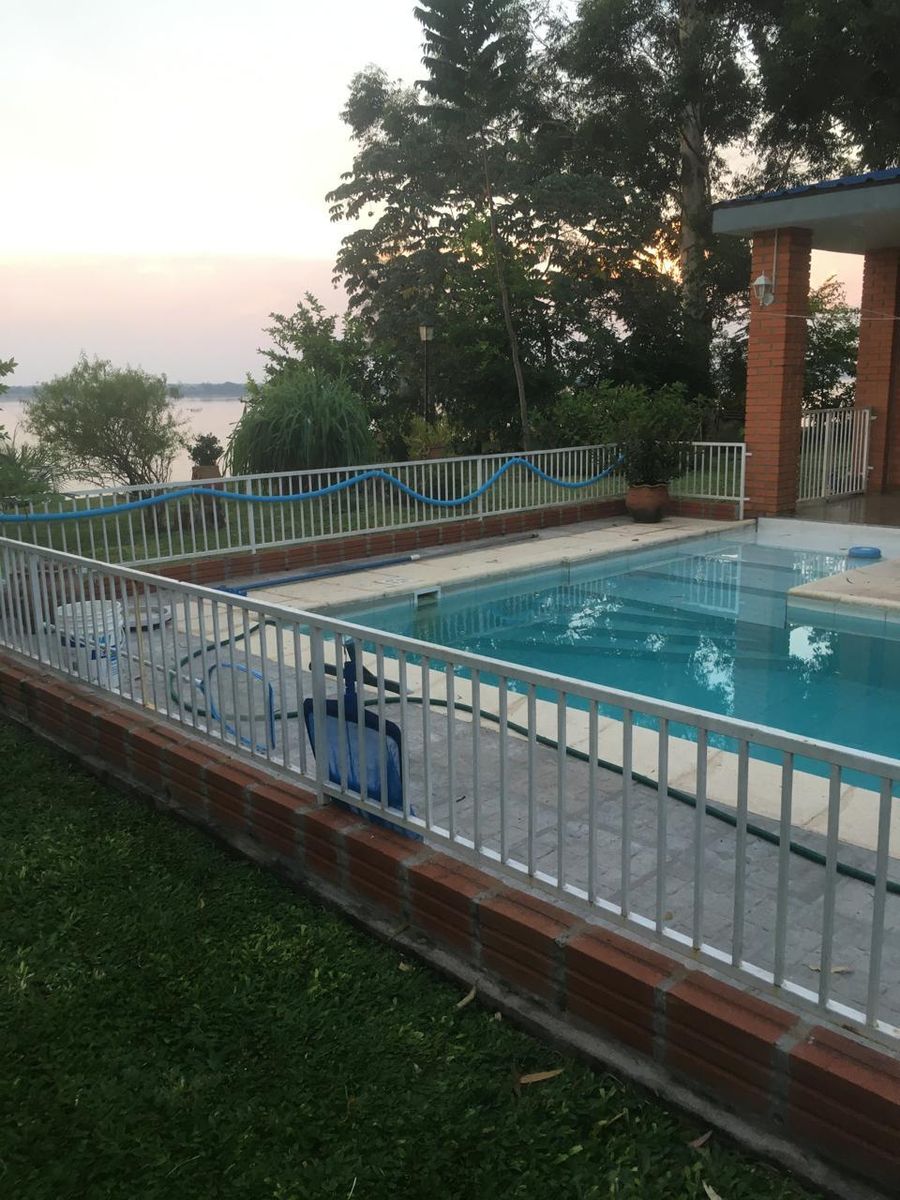 VENDO HERMOSA CASA ESTILO CAMPO EN EXCLUSIVO COUNTRY EN ITUZAINGO CORRIENTES — foto 6
