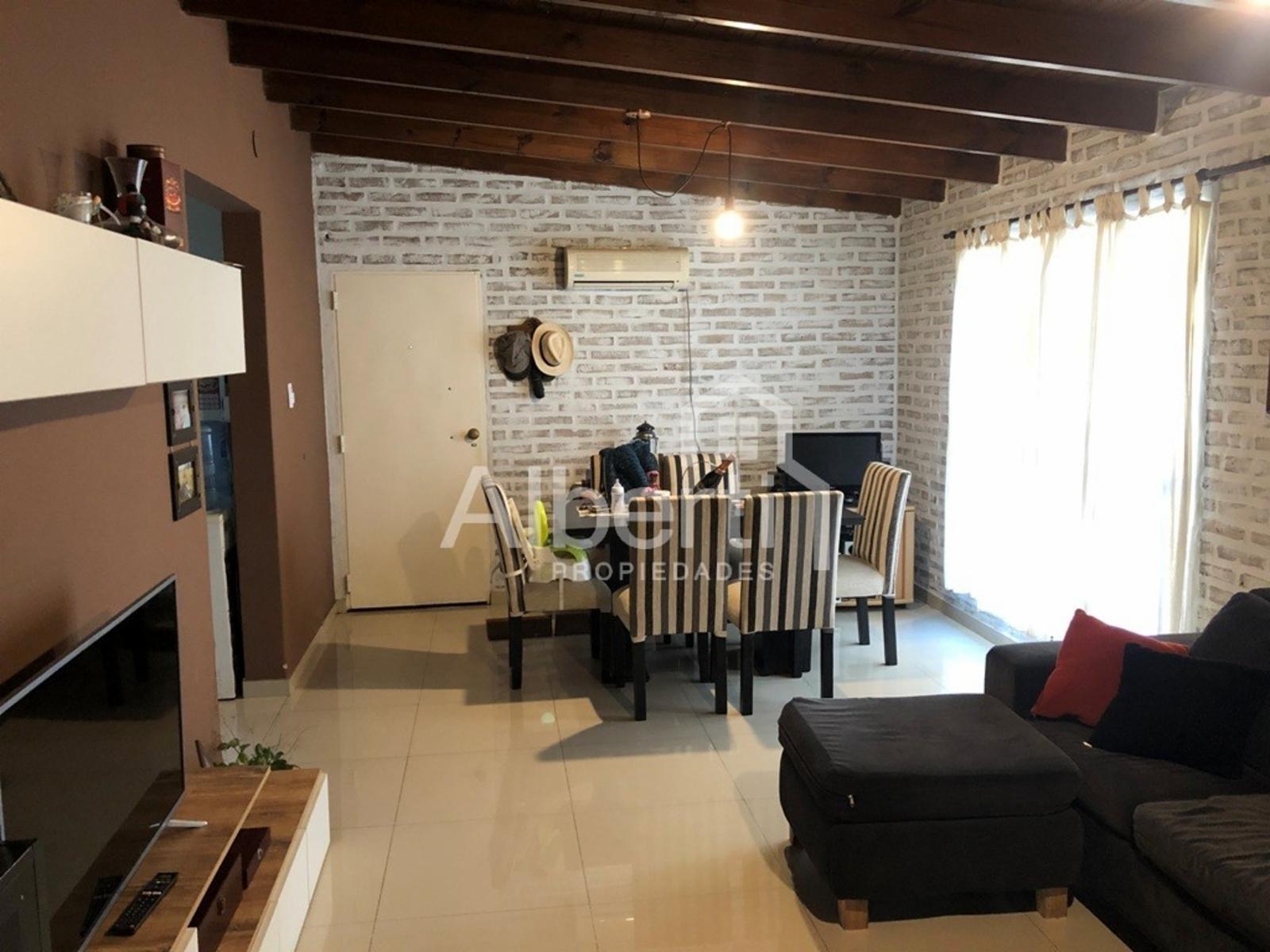 Casa PH que cuenta con garage patio y bello fondo libre.