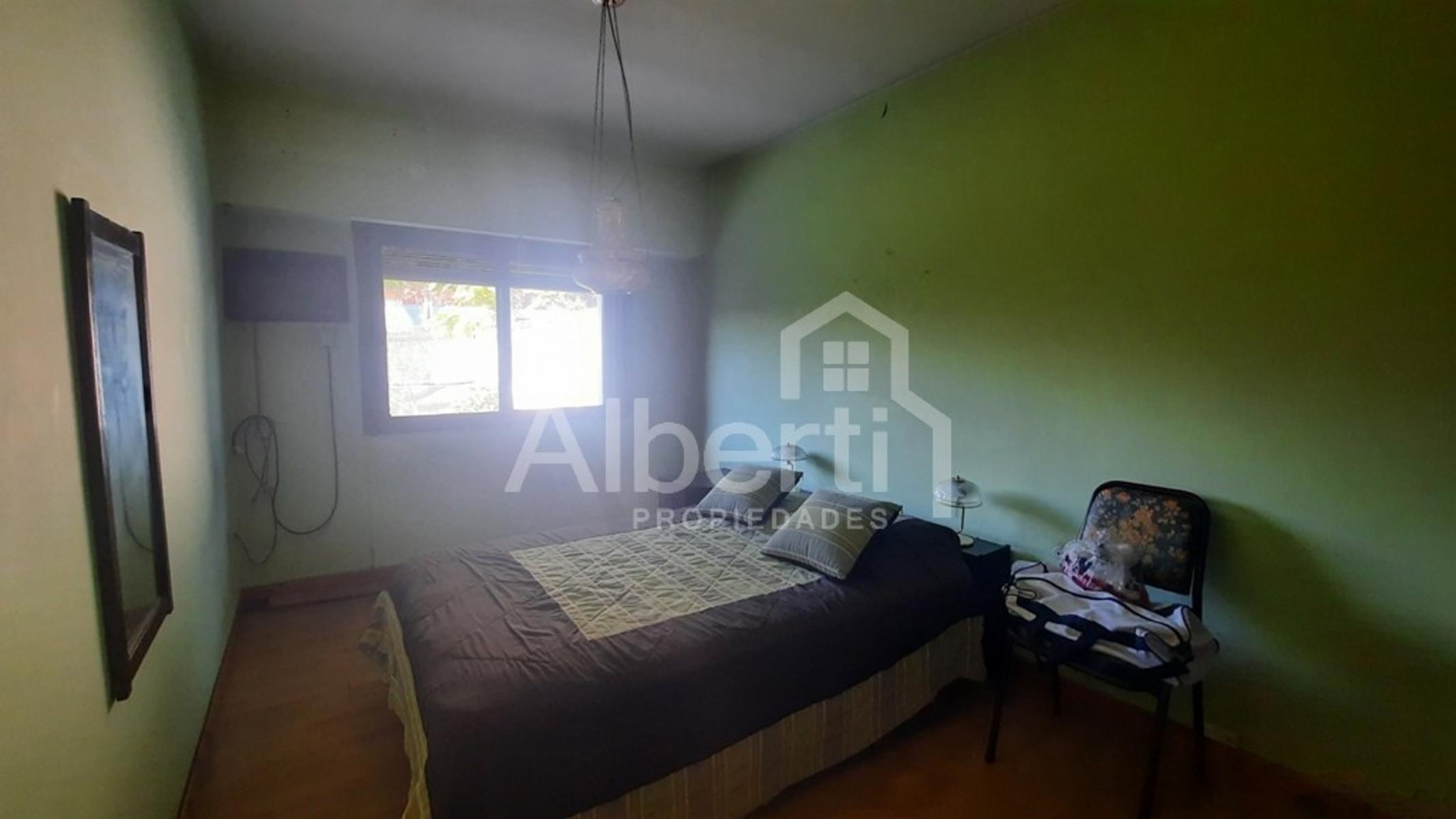 VENTA - CASA DE 4 AMBIENTES CON GRAN FONDO PARQUIZADO.- MERLO — foto 7