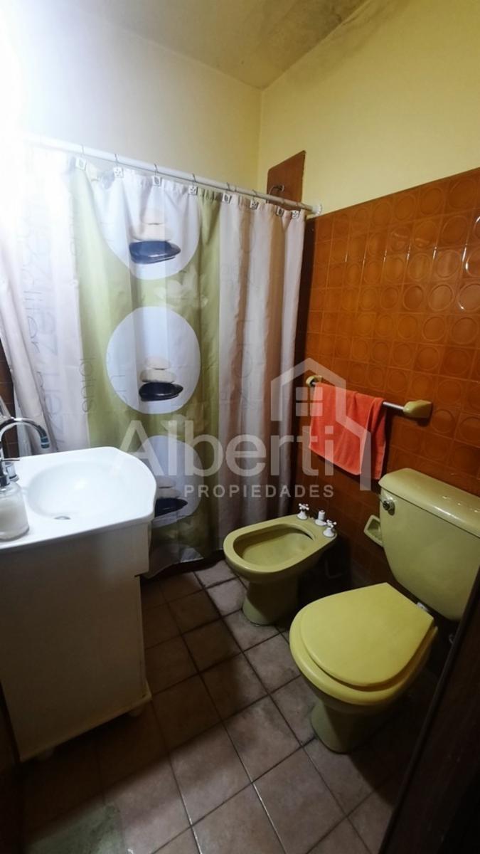 VENTA - CASA DE 4 AMBIENTES CON GRAN FONDO PARQUIZADO.- MERLO — foto 9