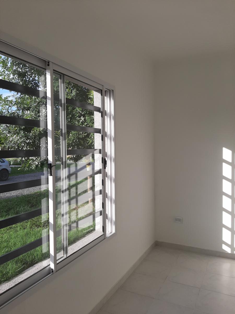 Un lugar para tu nueva vida Casa a estrenar, muy luminosa y buena ventilación en calle 90 M. derecha. — foto 4