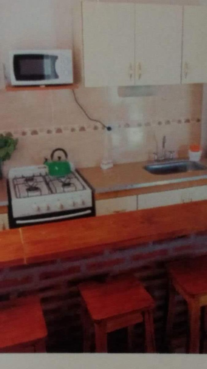TRIPLEX CON PARRILLA Y GARAGE - MAR DEL TUYU- A 5 CUADRAS DEL MAR — foto 7