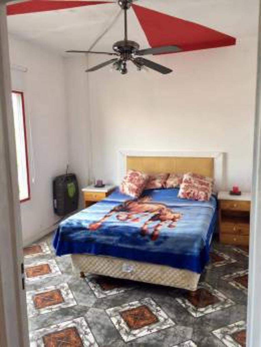 EXCELENTE TERRENO CON CONSTRUCCIÓN - 12