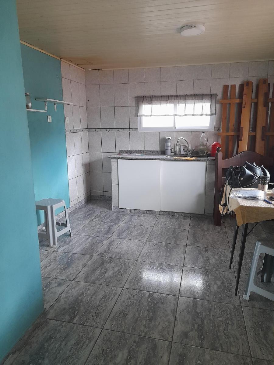 amplia casa en temperley — foto 2