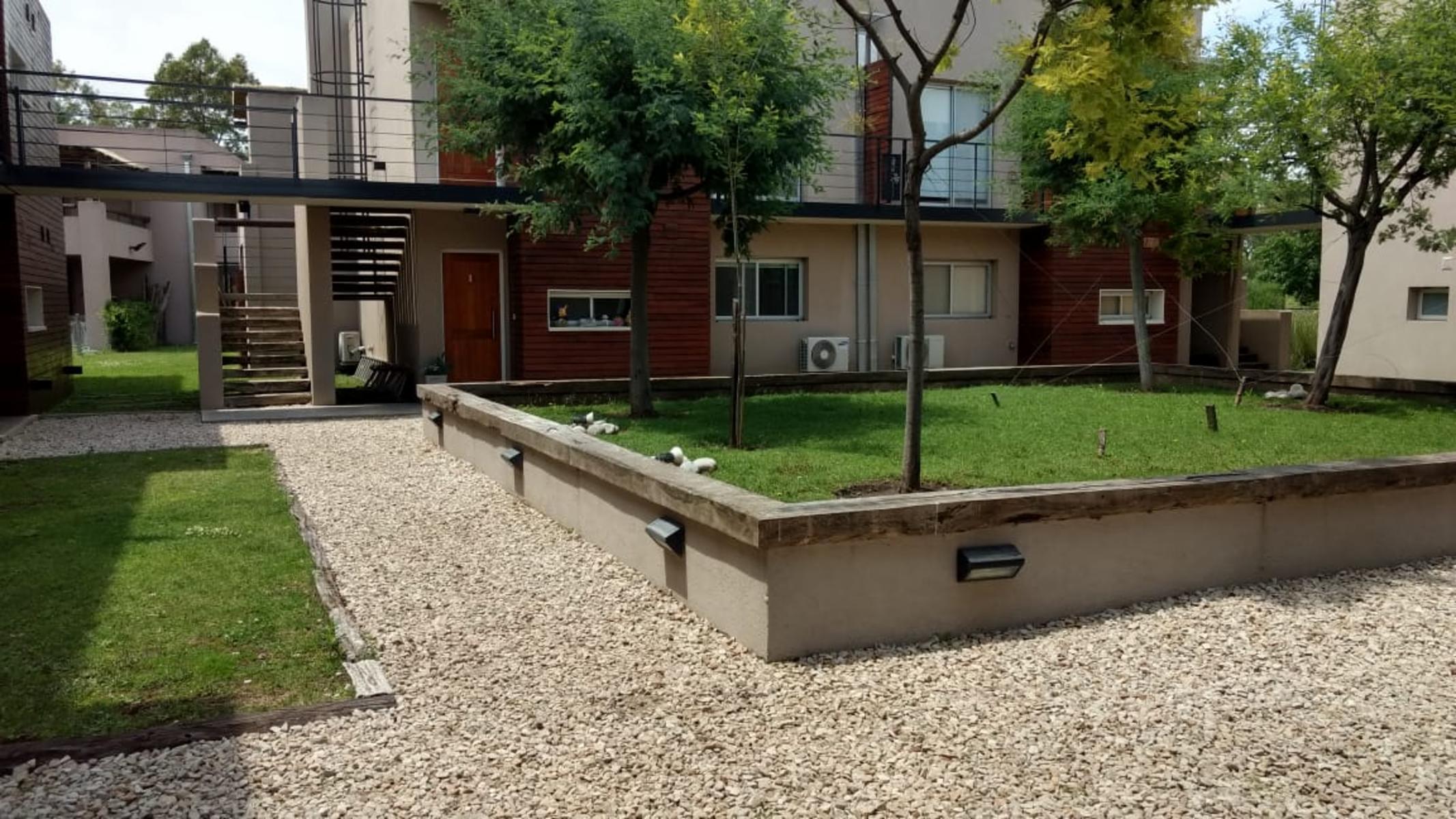 Venta Departamento Dormie PB 3 ambientes 2 dormitorios galeria parrilla jardin cochera en CC El Nacional — foto 4