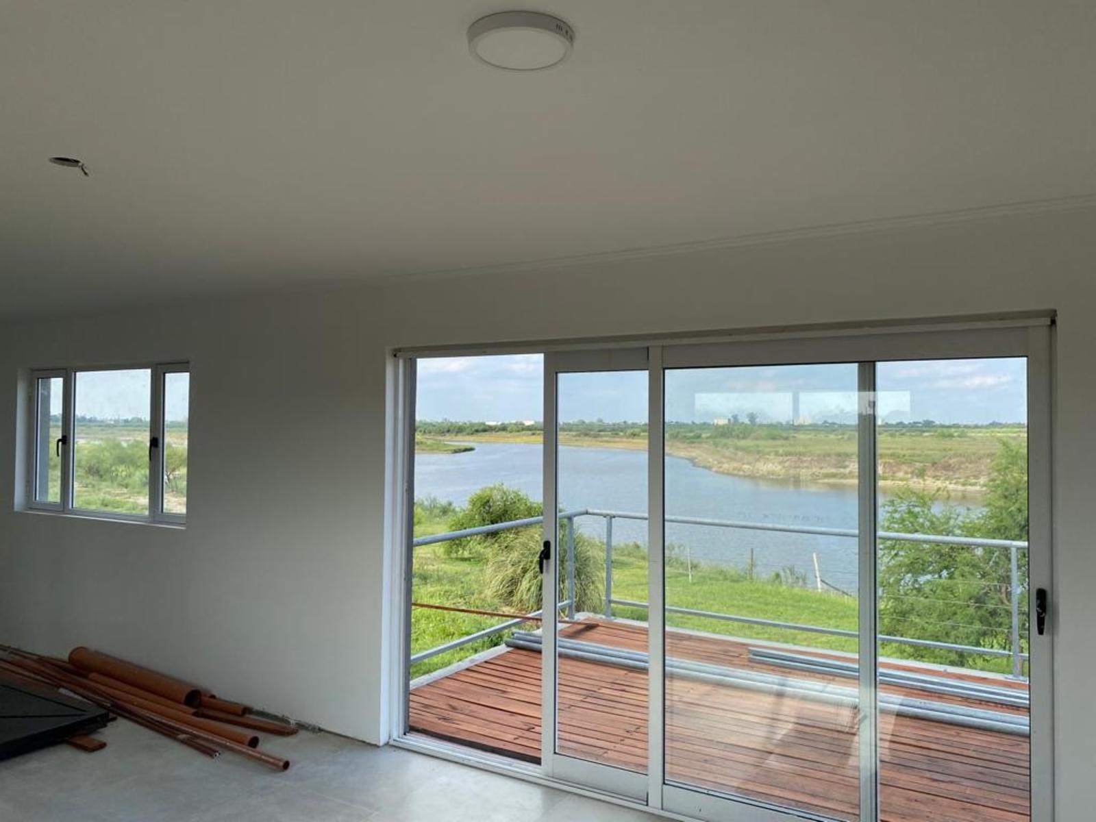 CASA A ESTRENAR FRENTE AL RIO AL LADO DE COUNTRY SOLARES DE PAUCKE. AUTOPISTA SANTA FE -ROSARIO — foto 4