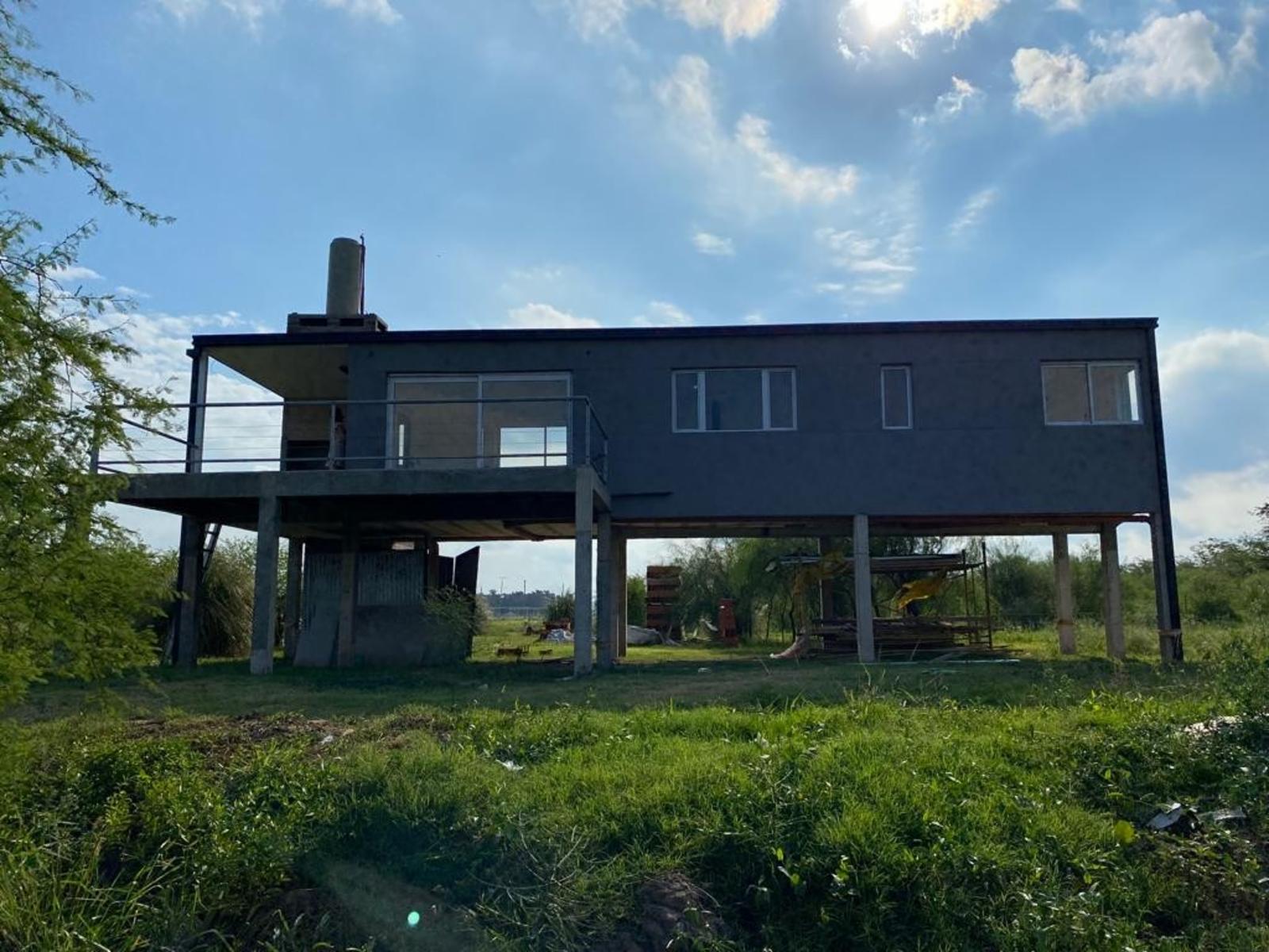 CASA A ESTRENAR FRENTE AL RIO AL LADO DE COUNTRY SOLARES DE PAUCKE. AUTOPISTA SANTA FE -ROSARIO — foto 8