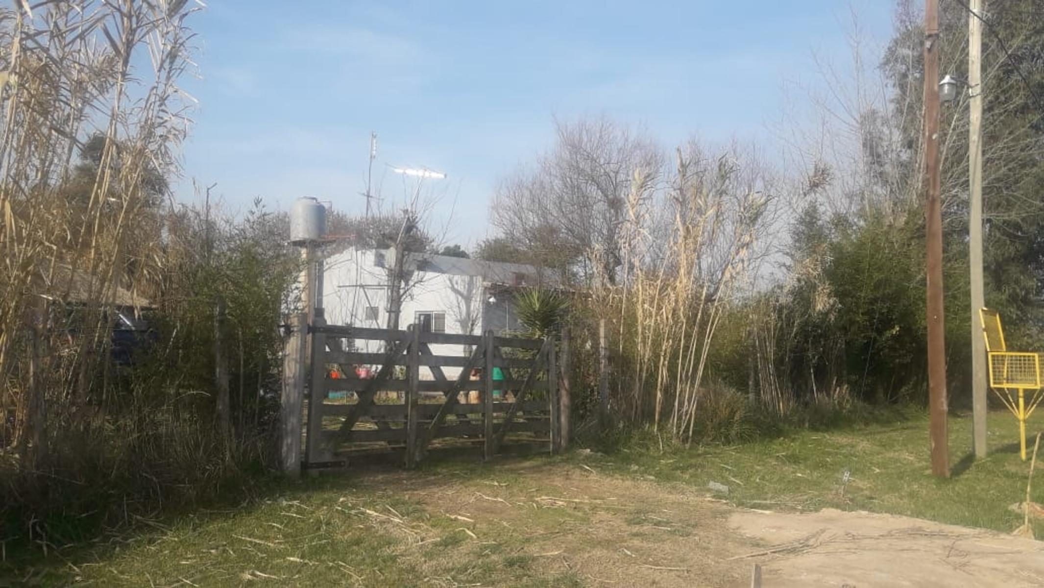 VENTA DE 7 LOTES CON 2 VIVIENDAS EN DOMSELAAR