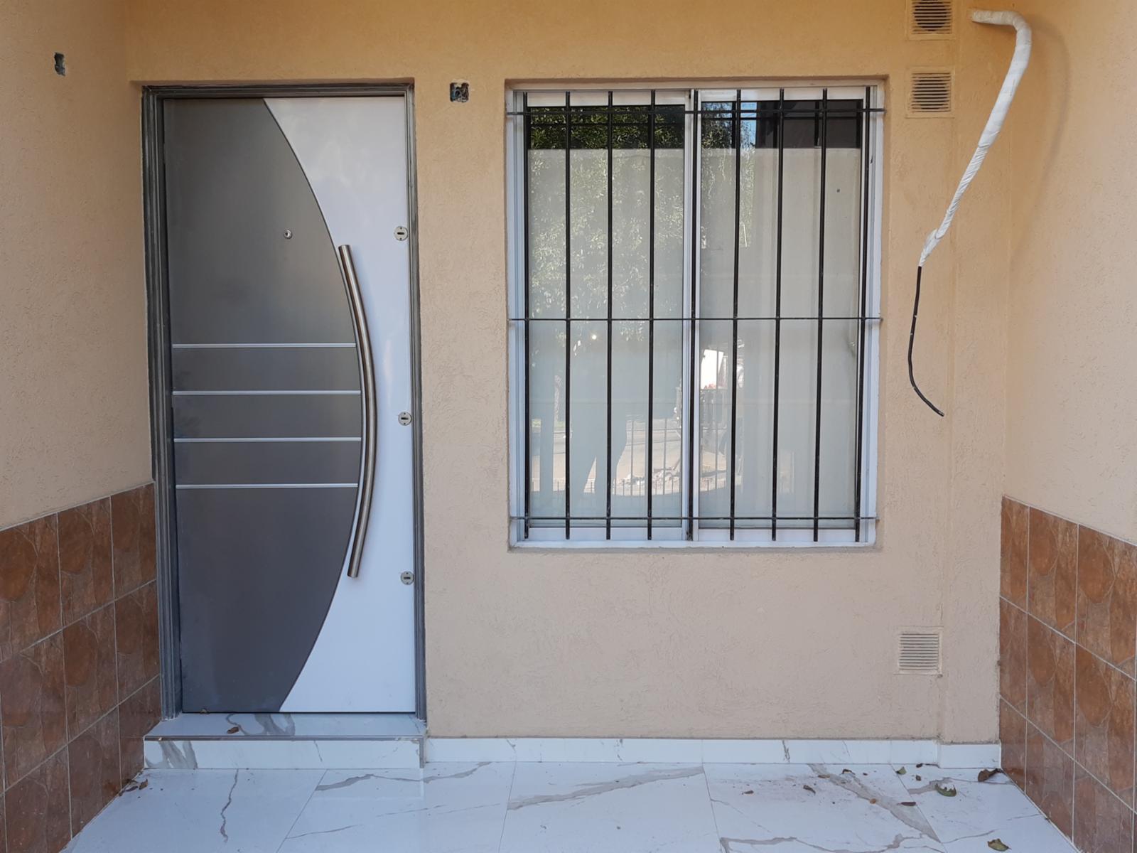 Departamento de dos ambientes con cochera y patio - Garibaldi 2000 Villa Luzuriaga