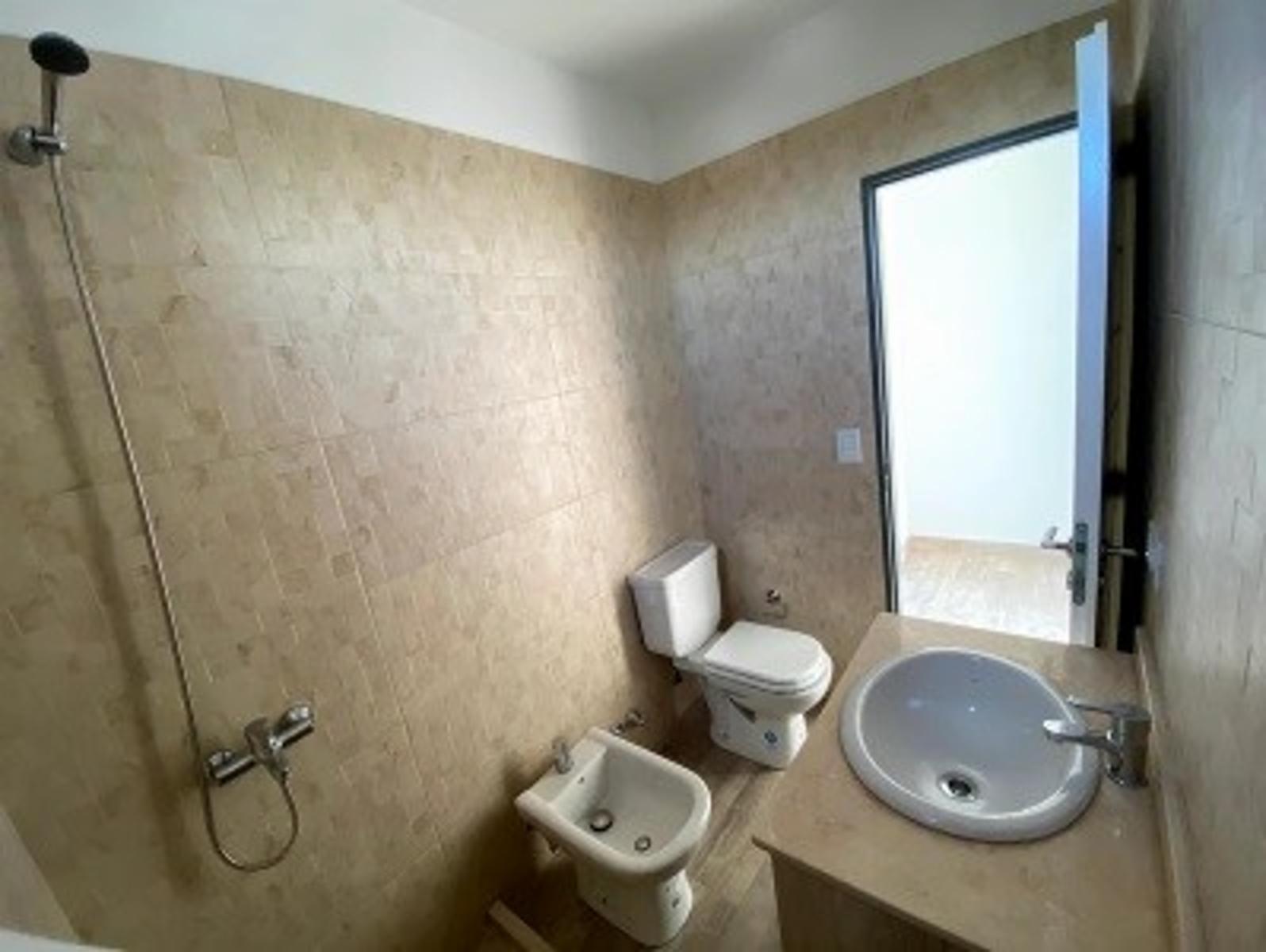 Departamentos de tres ambientes con cochera a estrenar - Int. Grant 300 Morón — foto 14
