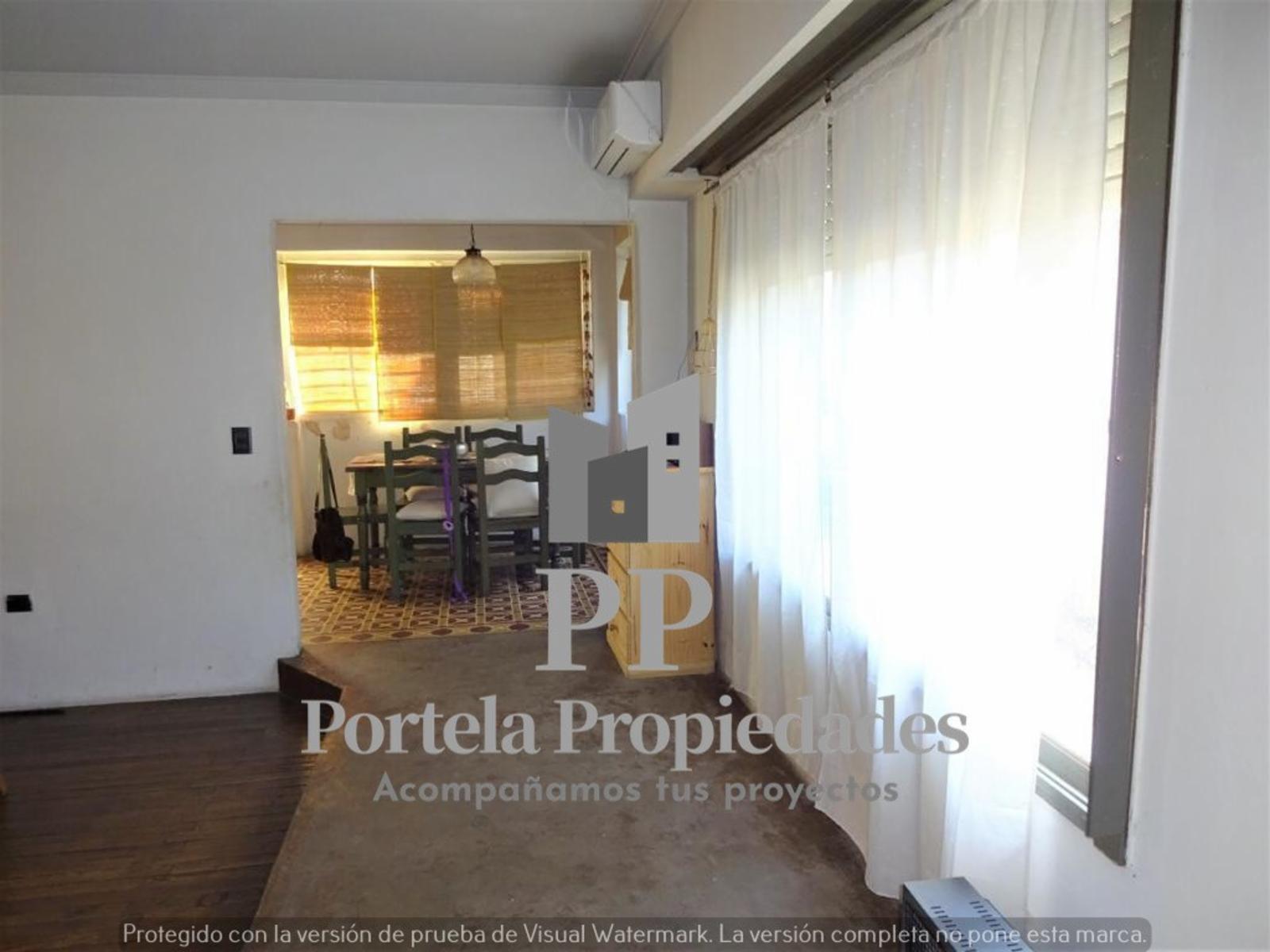AMPLIO LOTE DE 8.66 X 50 METROS CON 3 CASAS EN CASTELAR SUR — foto 3