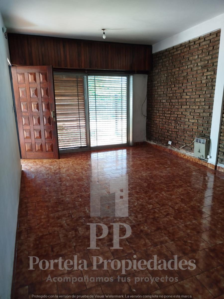 CASA DE 4 AMBIENTES CON FONDO Y GARAGE ITUZAINGO NORTE — foto 3