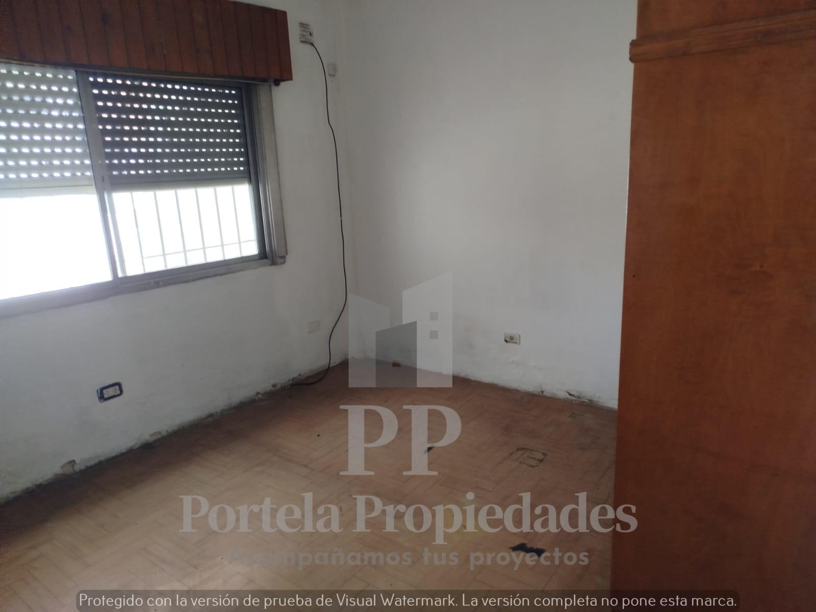 CASA DE 4 AMBIENTES CON FONDO Y GARAGE ITUZAINGO NORTE — foto 6