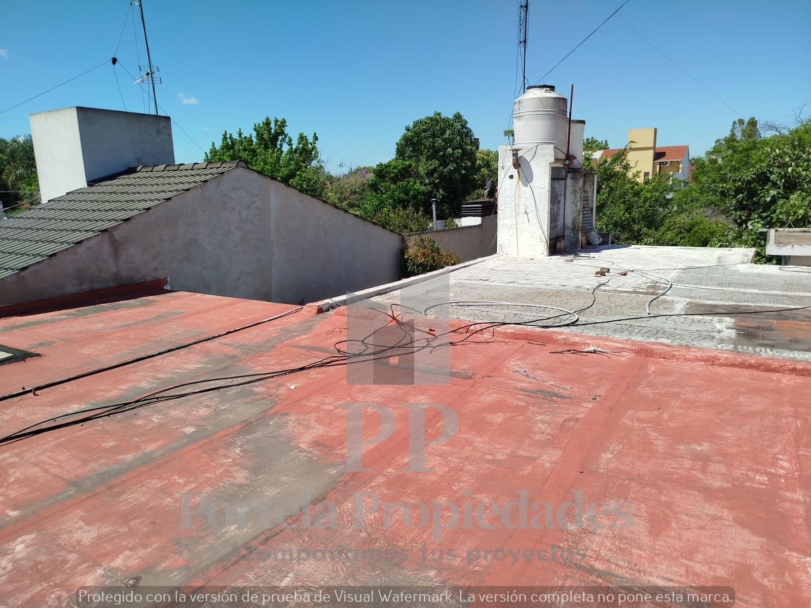 CASA DE 4 AMBIENTES CON FONDO Y GARAGE ITUZAINGO NORTE — foto 10