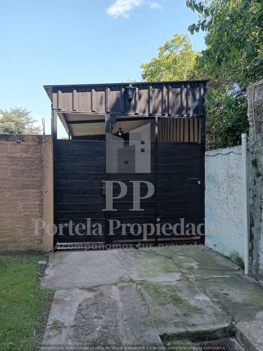 CASA CON NEGOCIO Y DEPARTAMENTOS EN ITUZAINGO NORTE — foto 7