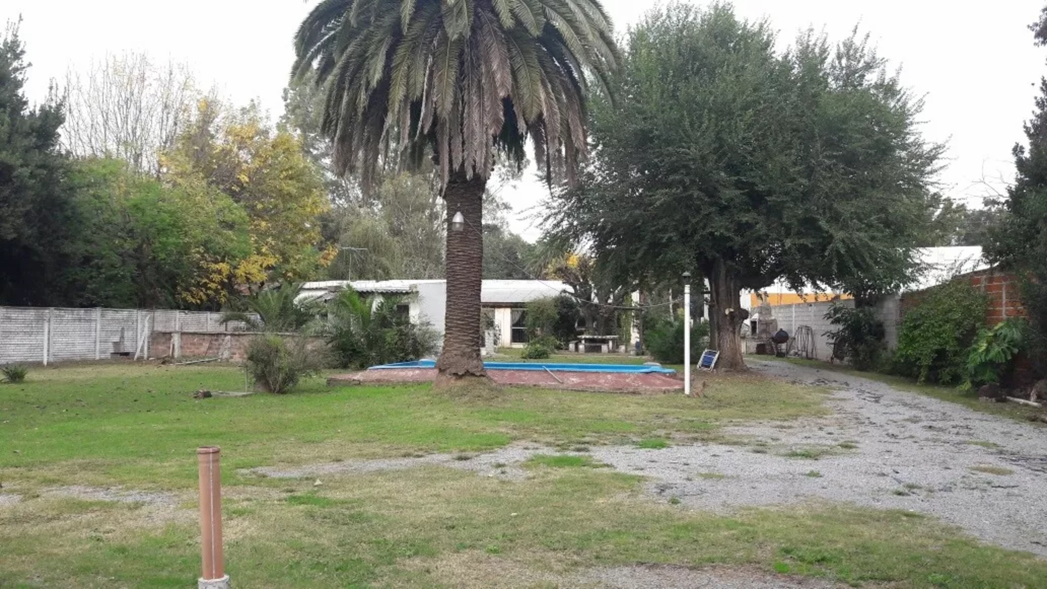 EXCELENTE LOTE CON VIVIENDAS EN VENTA - MERLO — foto 2