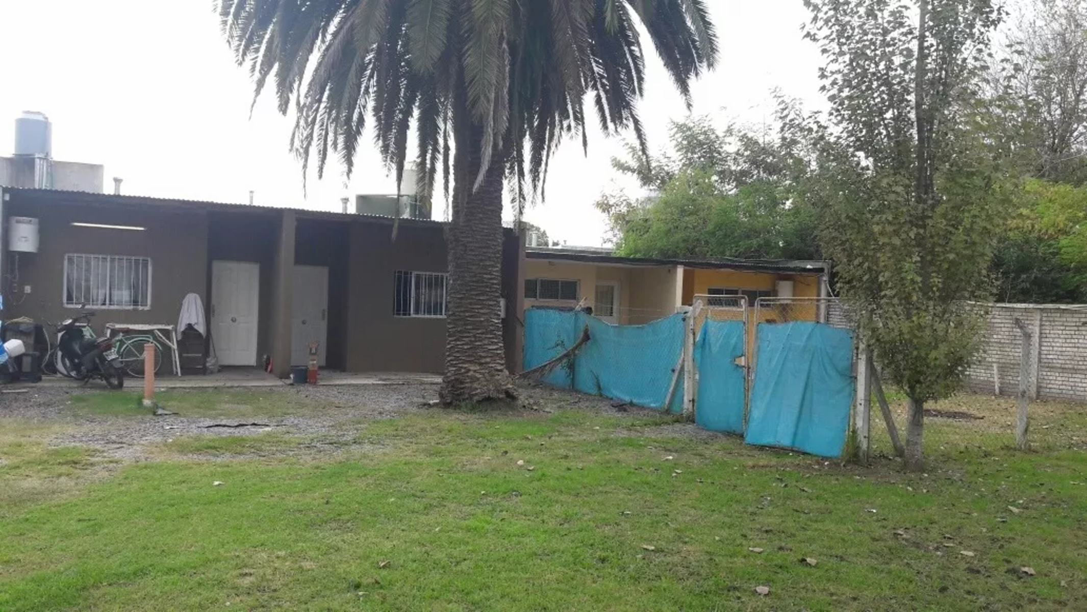 EXCELENTE LOTE CON VIVIENDAS EN VENTA - MERLO — foto 3