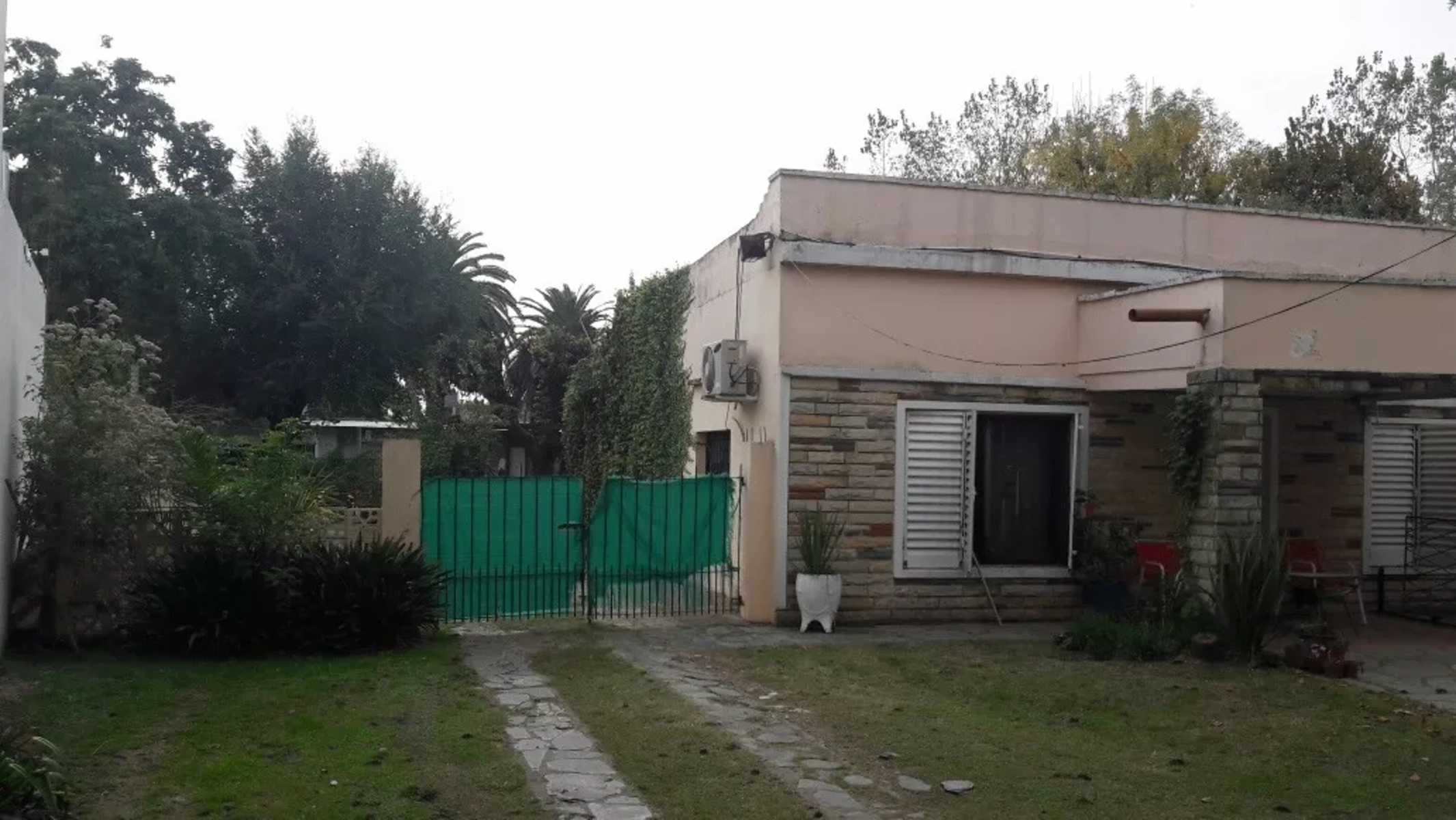 EXCELENTE LOTE CON VIVIENDAS EN VENTA - MERLO — foto 5