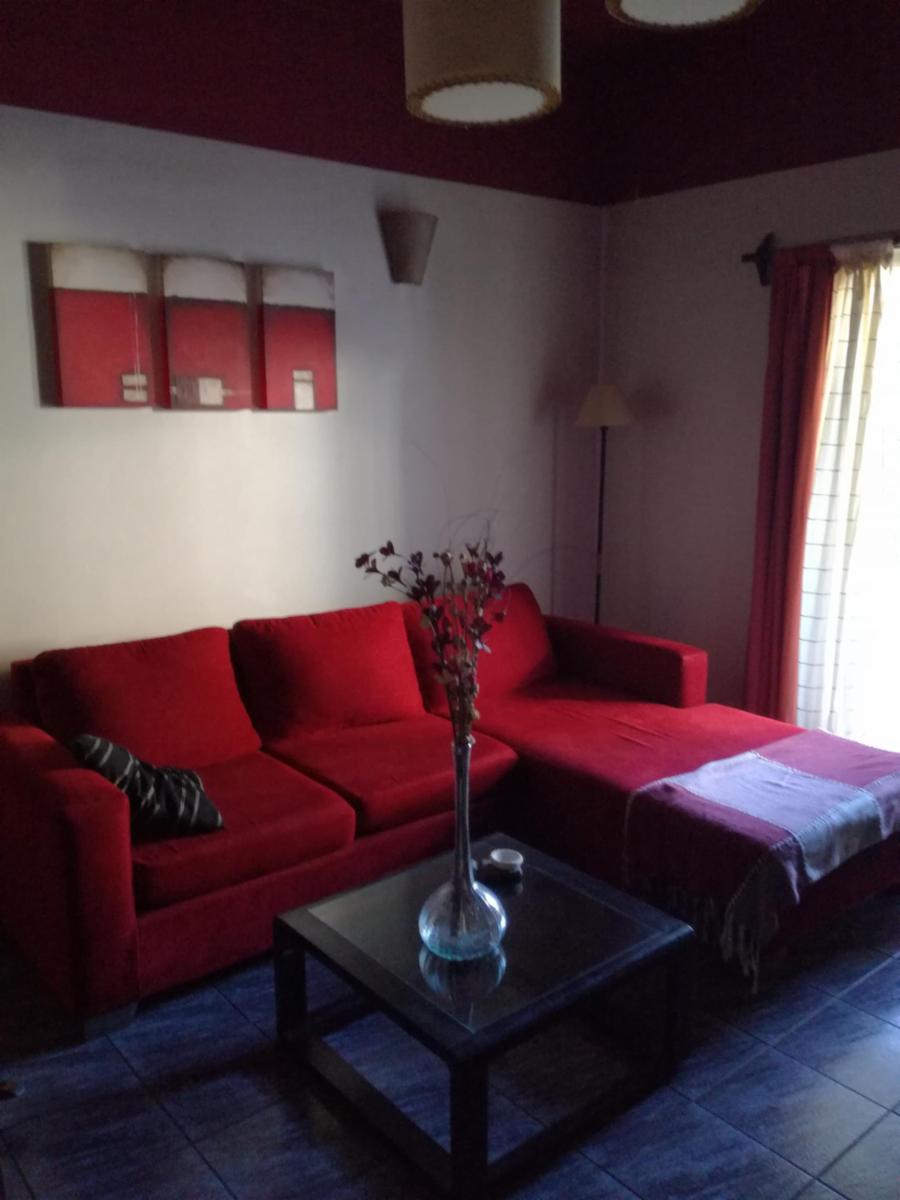 Excelente casa 5 ambientes con fondo, quincho y garaje — foto 12