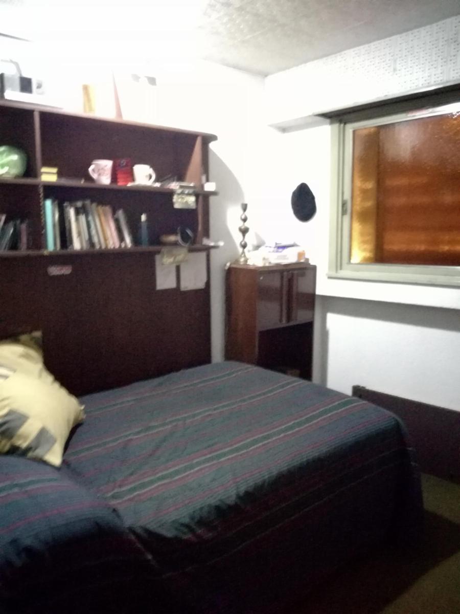 Excelente casa 5 ambientes con fondo, quincho y garaje — foto 14
