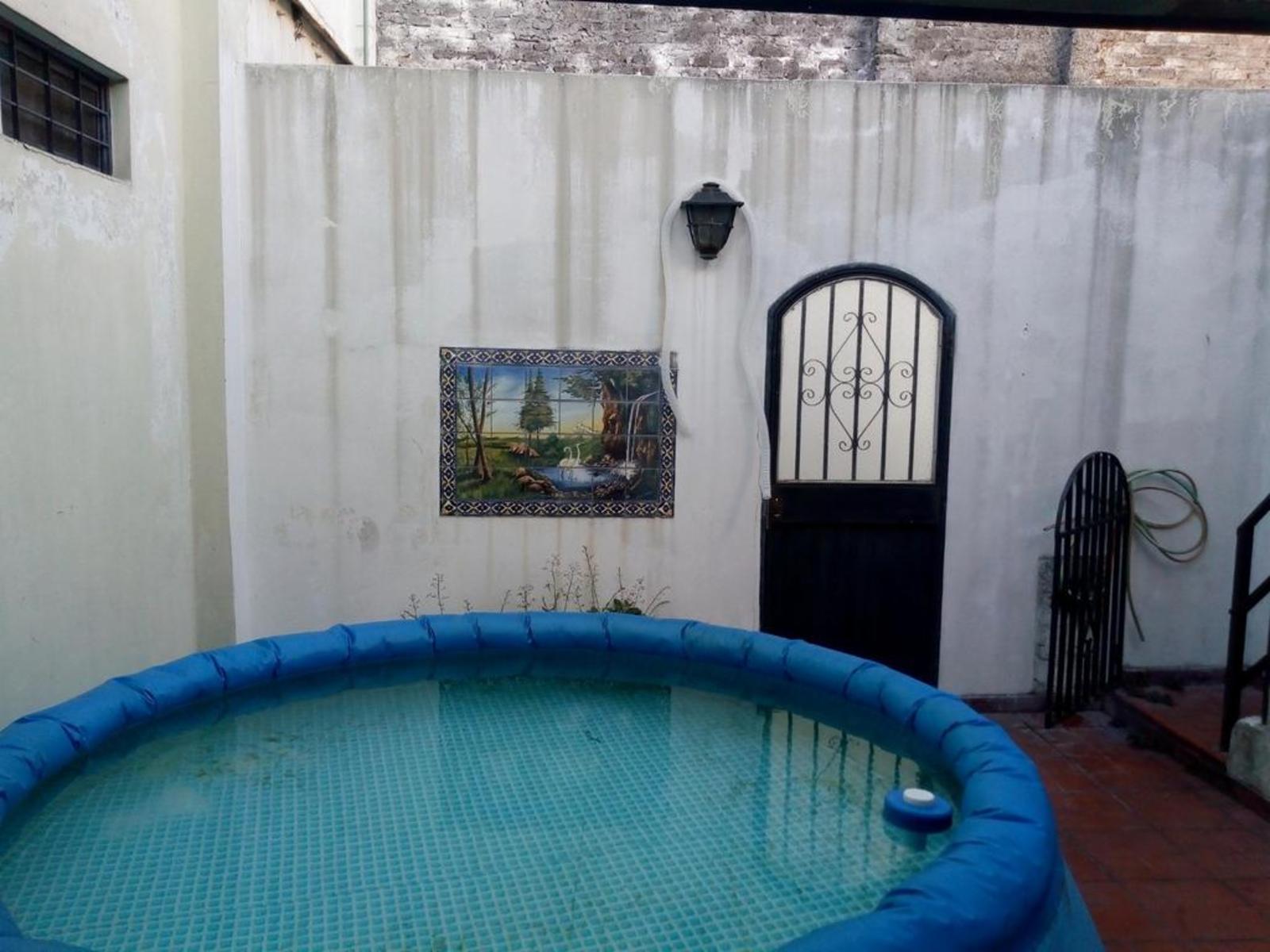 GRAN CASA DE 5 AMBIENTES CON PATIO Y GARAGE — foto 11