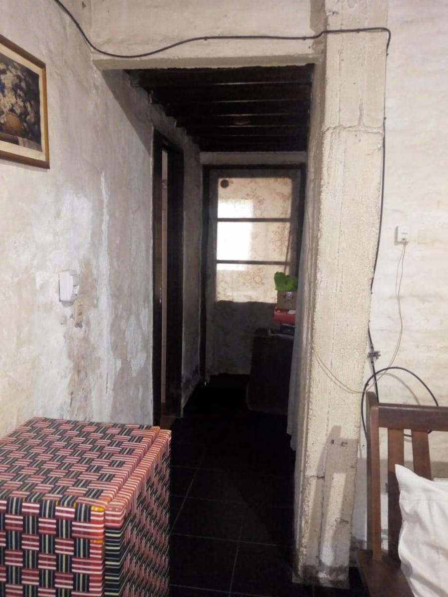 CASA DE 3 AMBIENTES CON JARDÍN DE FRENTE, PATIO Y COCHERA DESCUBIERTA — foto 7