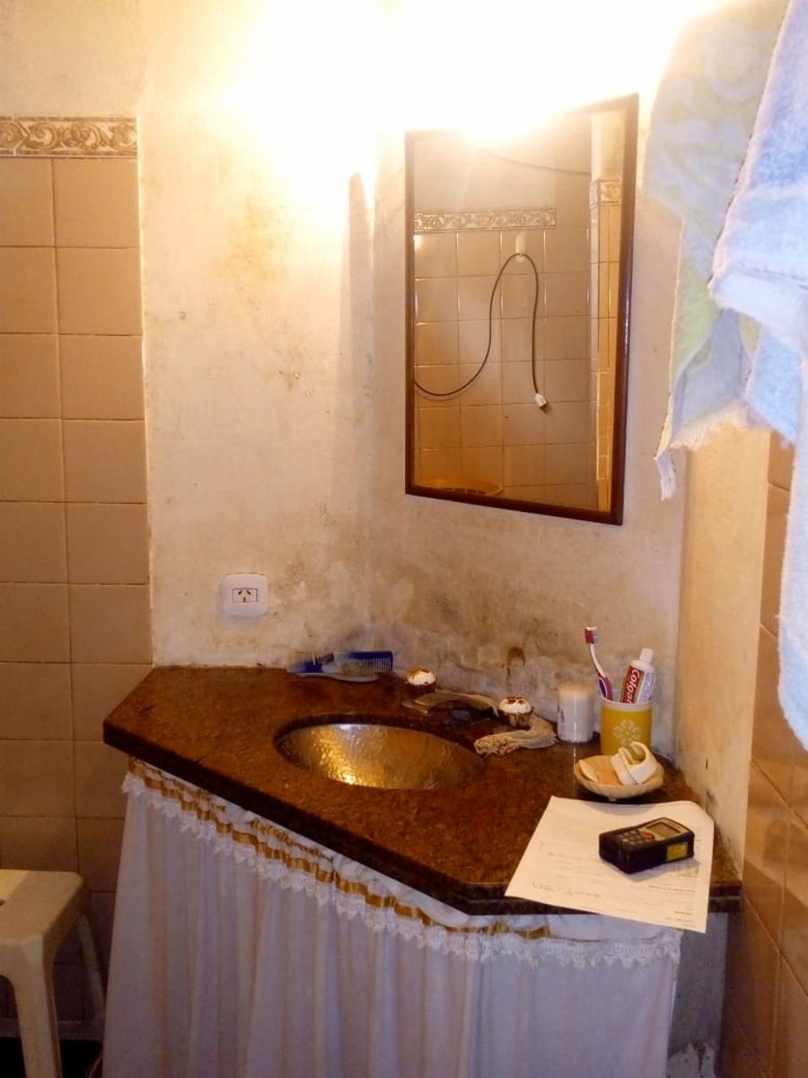 CASA DE 3 AMBIENTES CON JARDÍN DE FRENTE, PATIO Y COCHERA DESCUBIERTA — foto 12