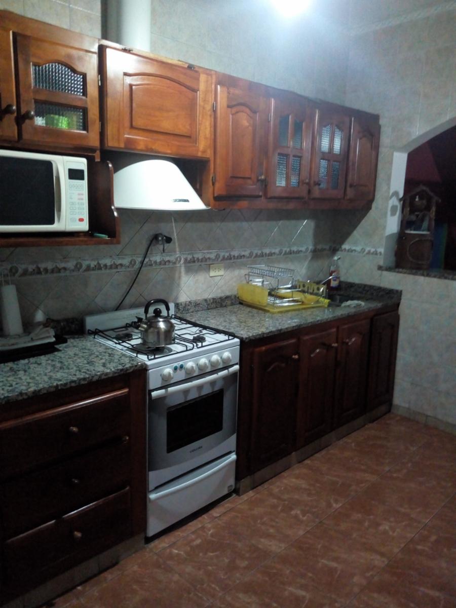 CASA DE 4 AMBIENTES EN EXCELENTE ESTADO CON LOCAL COMERCIAL EN FUNCIONAMIENTO — foto 7