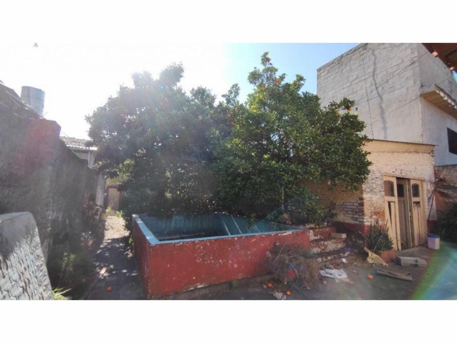 Terreno de 293,8m² (10 X 29,38) con casa de 3 ambientes con pileta y galpón — foto 5