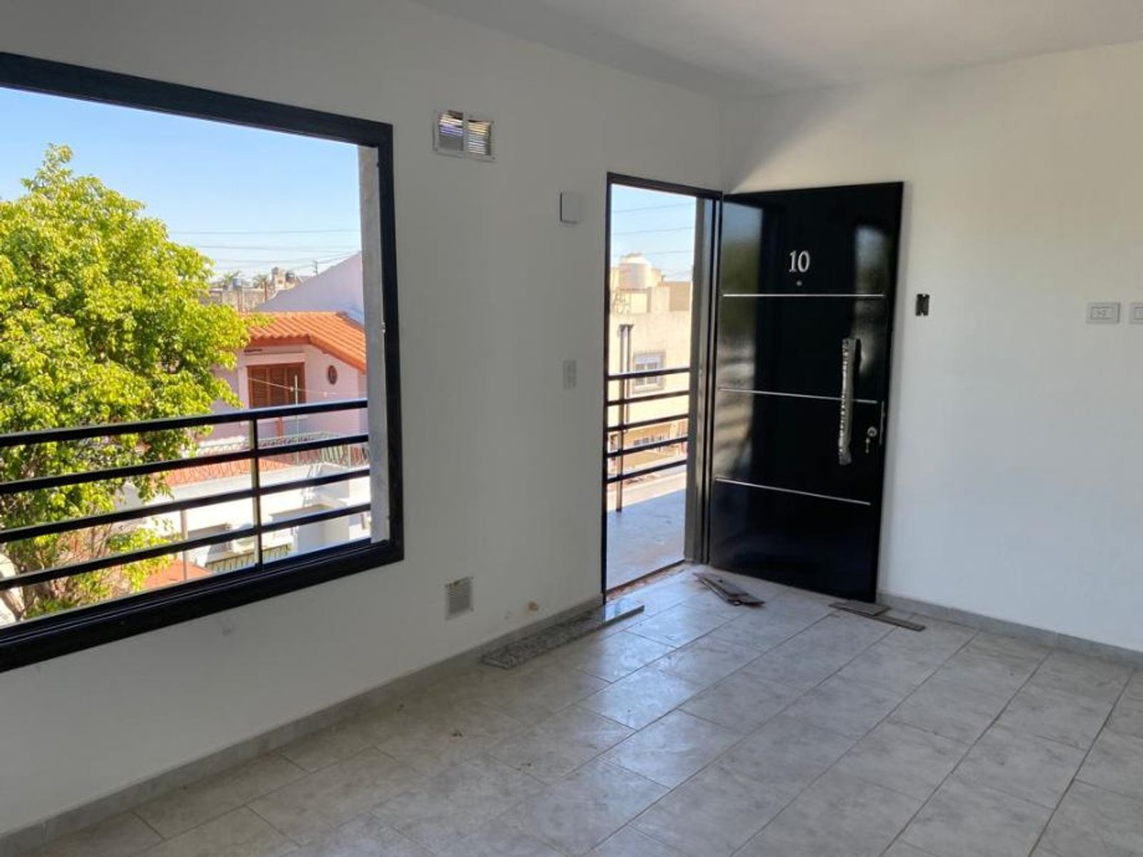DEPARTAMENTO DE 2 AMBIENTES EN PLANTA BAJA CON COCHERA DESCUBIERTA - 4
