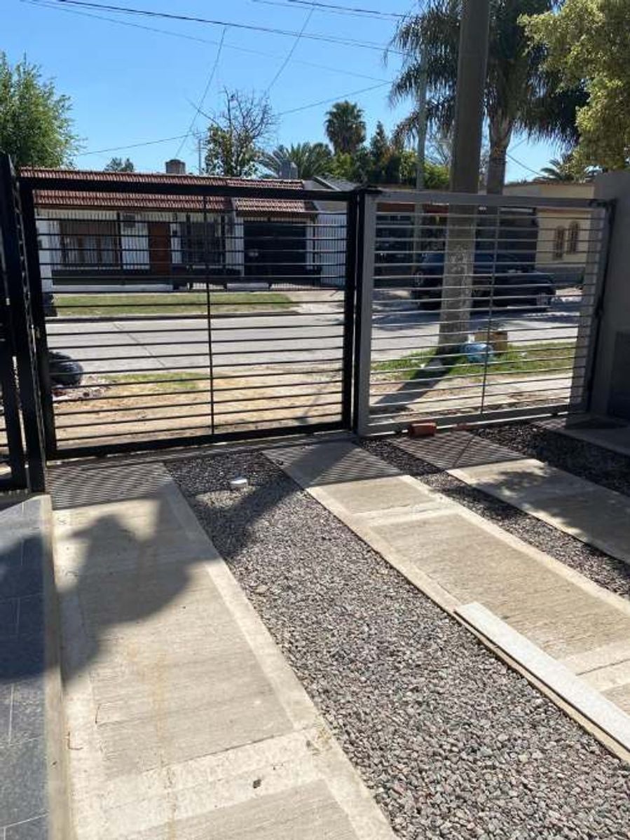 DEPARTAMENTO DE 2 AMBIENTES EN PLANTA BAJA CON COCHERA DESCUBIERTA - 5