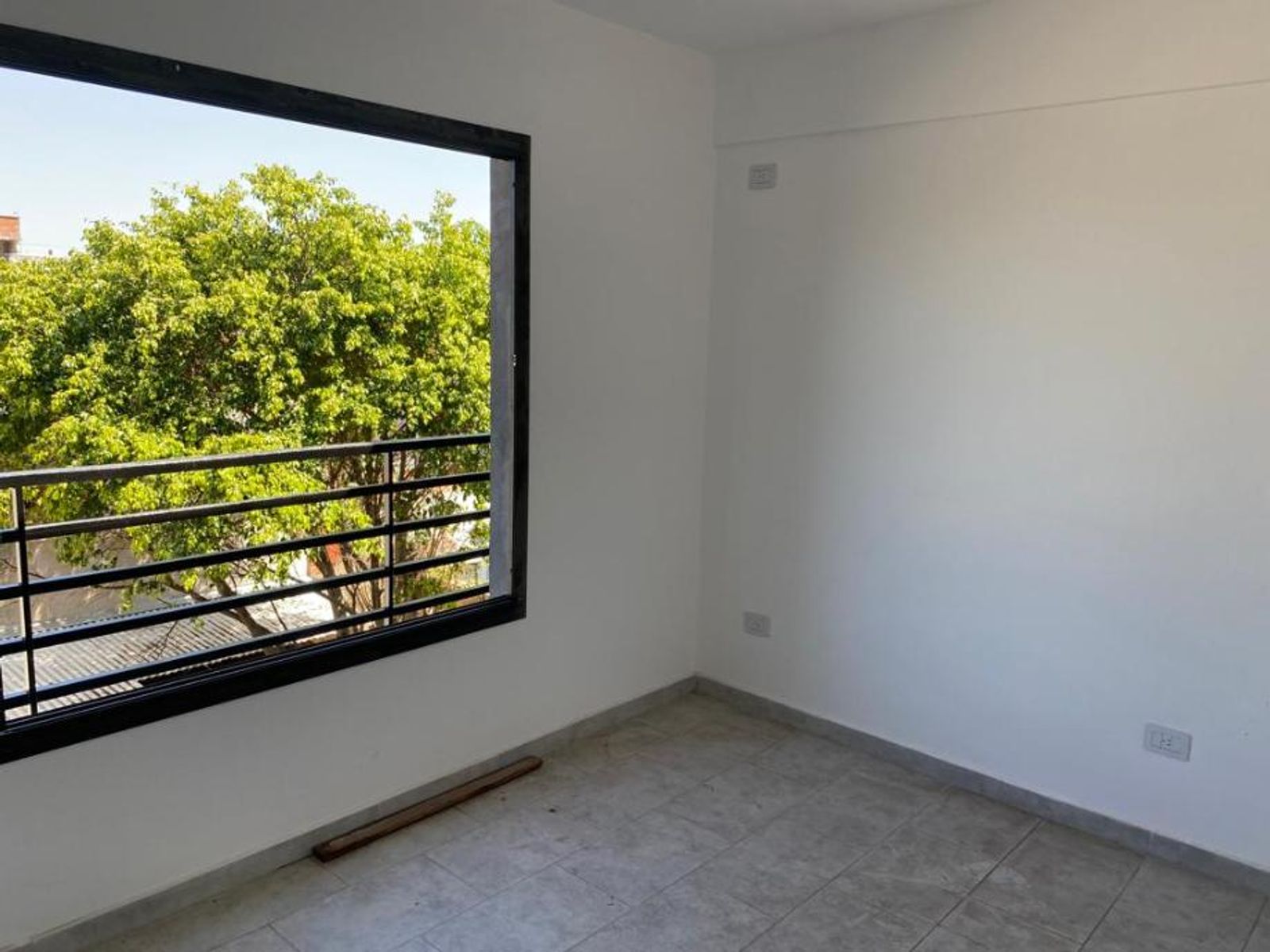 DEPARTAMENTO DE 2 AMBIENTES EN PLANTA BAJA CON COCHERA DESCUBIERTA - 7