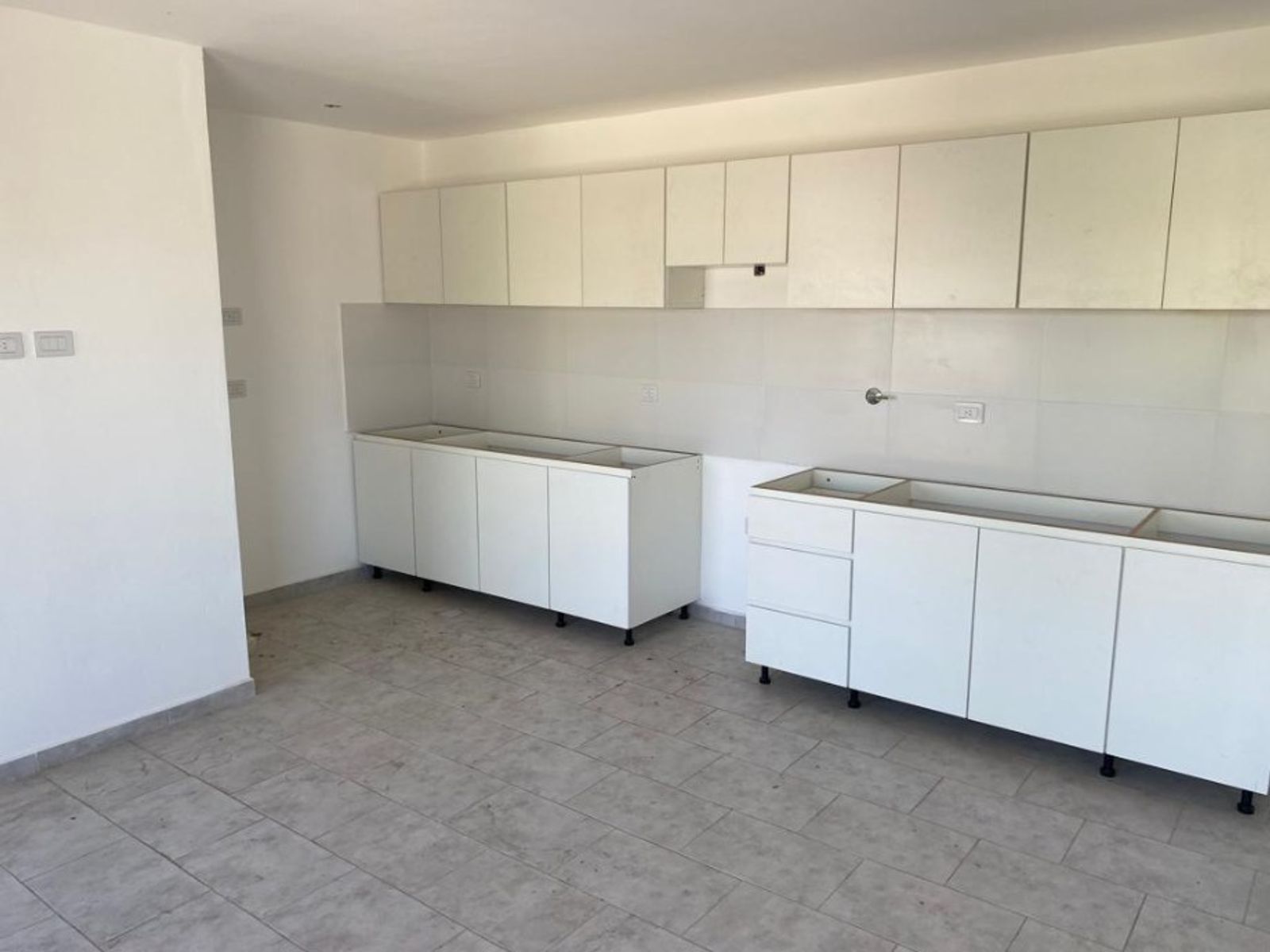 DEPARTAMENTO DE 2 AMBIENTES EN PLANTA BAJA CON COCHERA DESCUBIERTA - 8