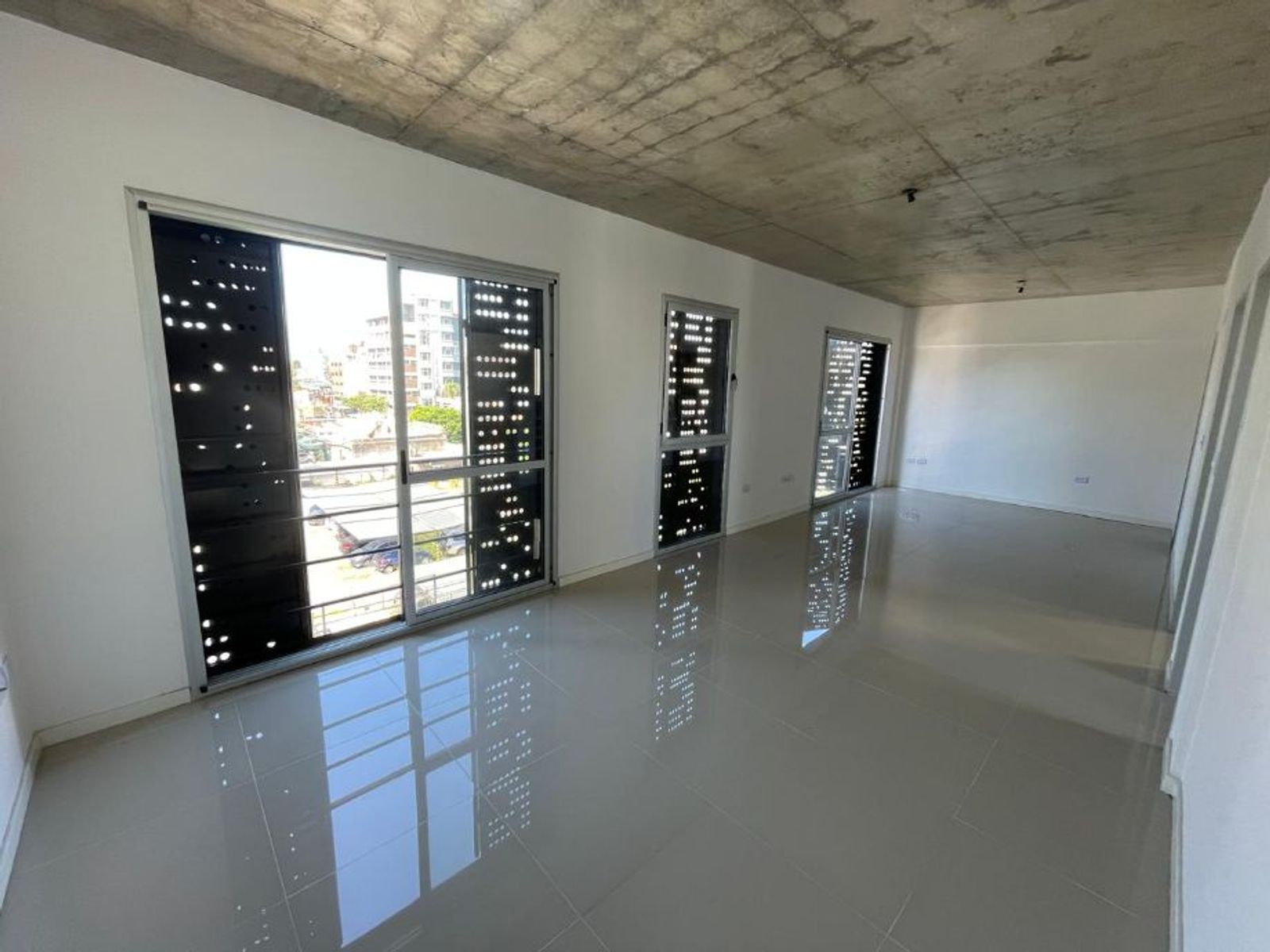 DEPARTAMENTOS DE 2 AMBIENTES C/ BALCON - COCHERAS OPCIONALES - 15