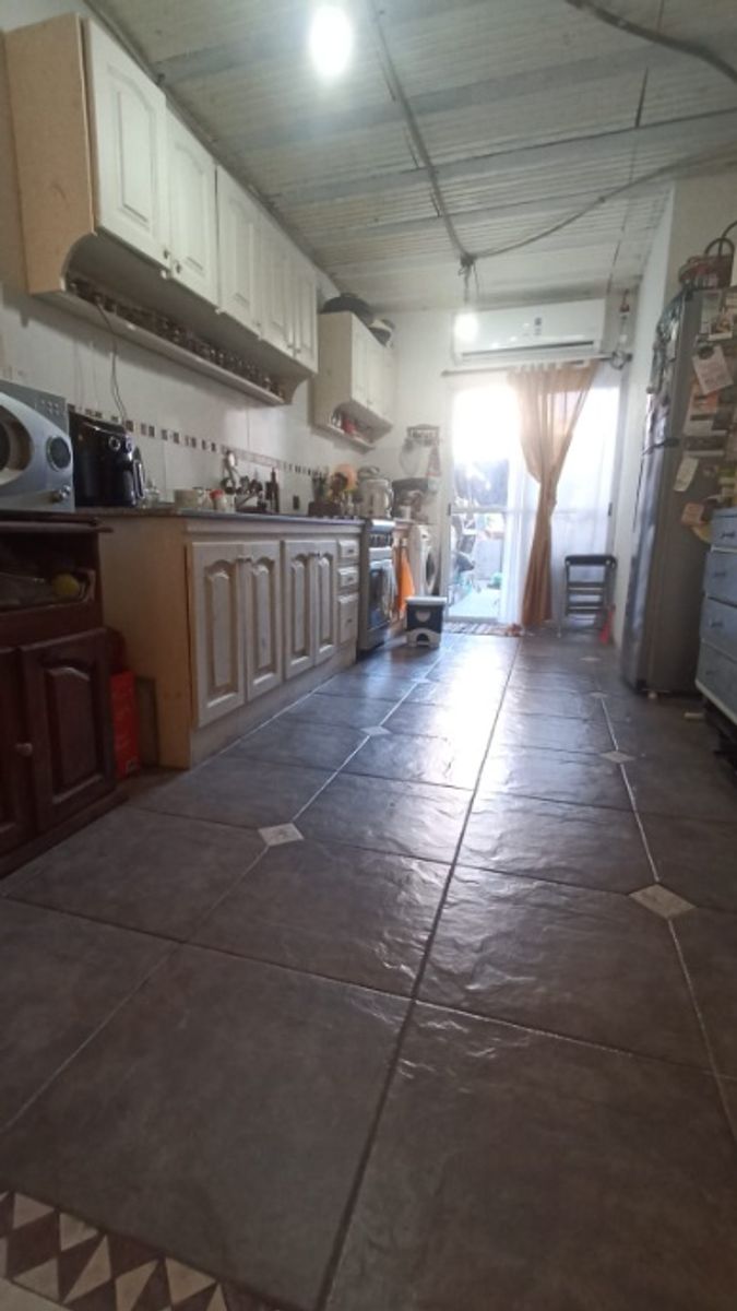 CASA IDEAL DOS/TRES FAMILIAS DESARROLLADA EN TRES PARTES - 44