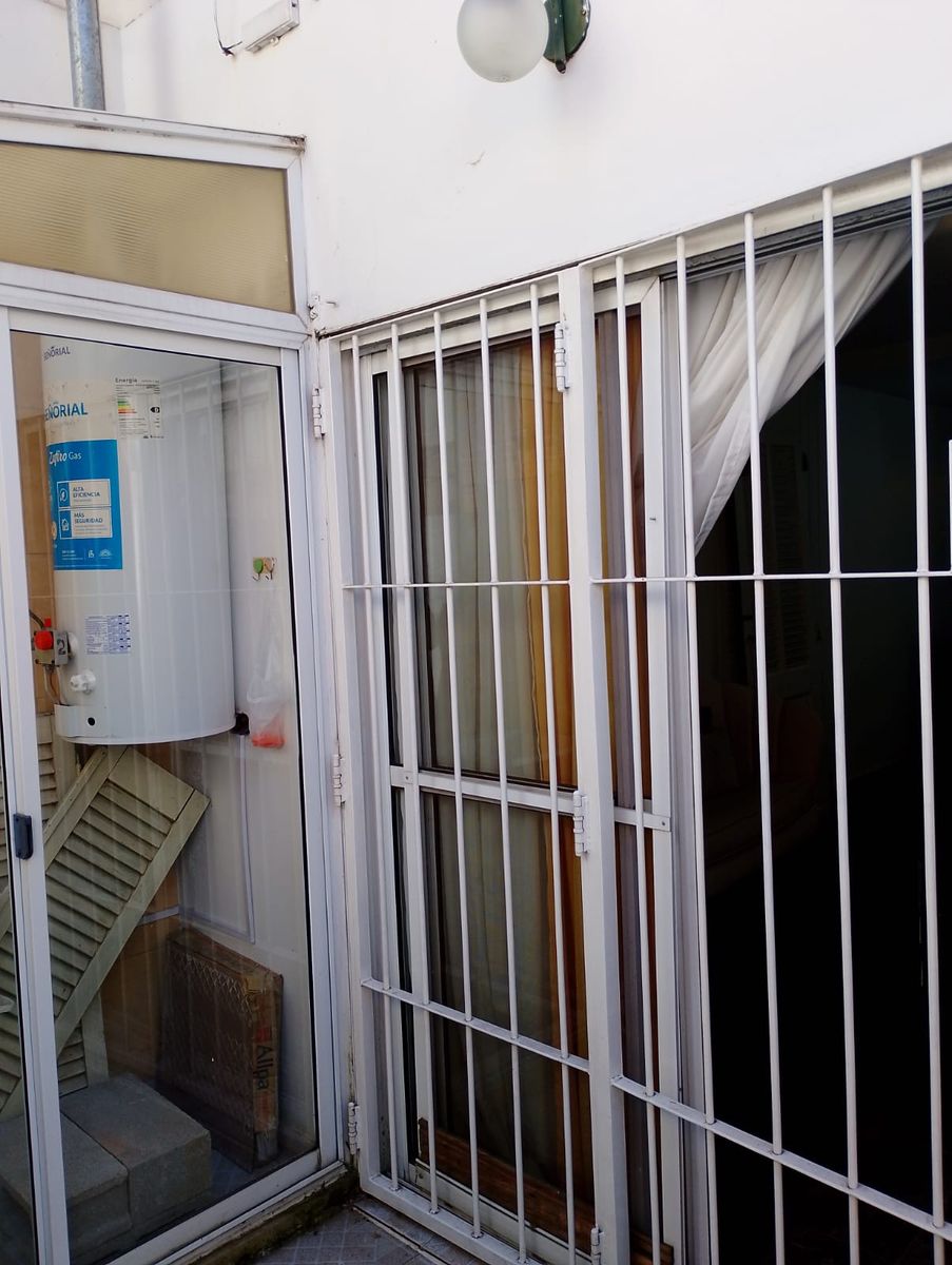 DEPARTAMENTO DE 2 AMBIENTES CON COCHERA - 1