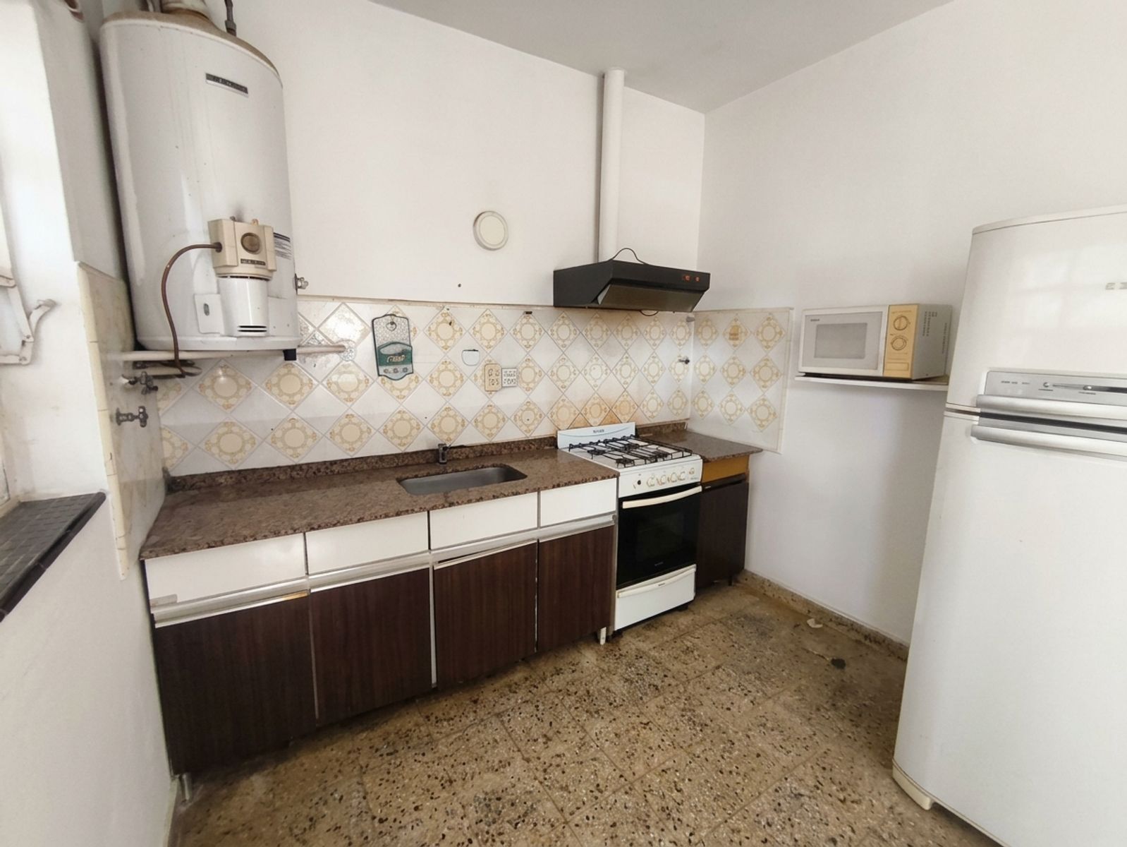 Propiedad Multifamiliar con Dos Viviendas, Terrazas y Patio con Parrilla — foto 9