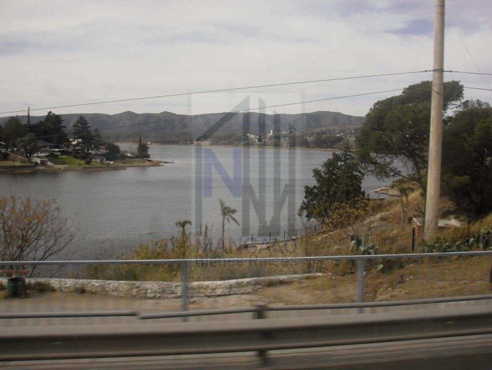 LOTE EN VILLA CARLOS PAZ APTO EMPRENIMIENTO — foto 2