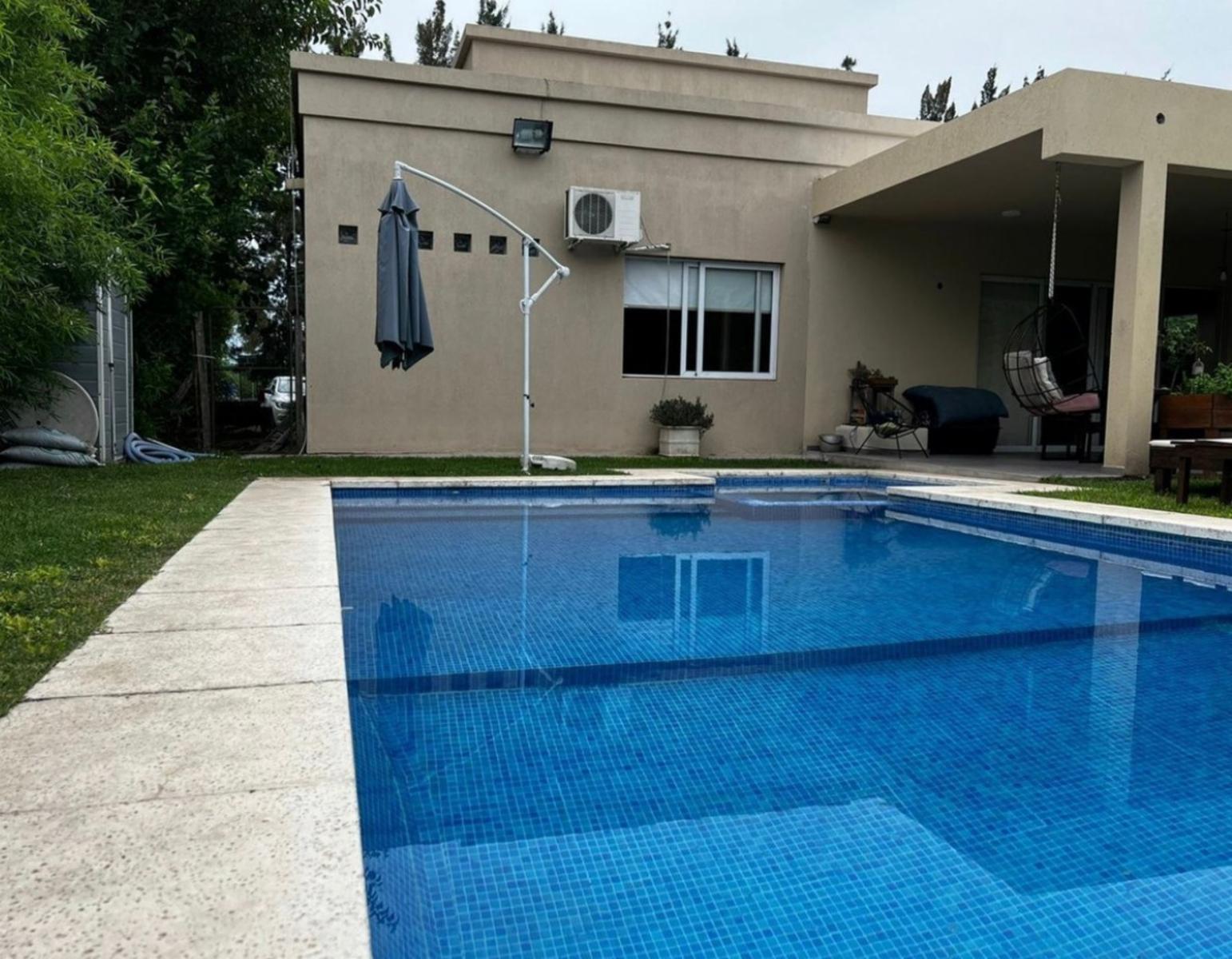 CHALET HORACIO DE QUIROGA, ALTOS DEL SOL, VILLA UDAONDO (ITUZAINGÓ) — foto 2