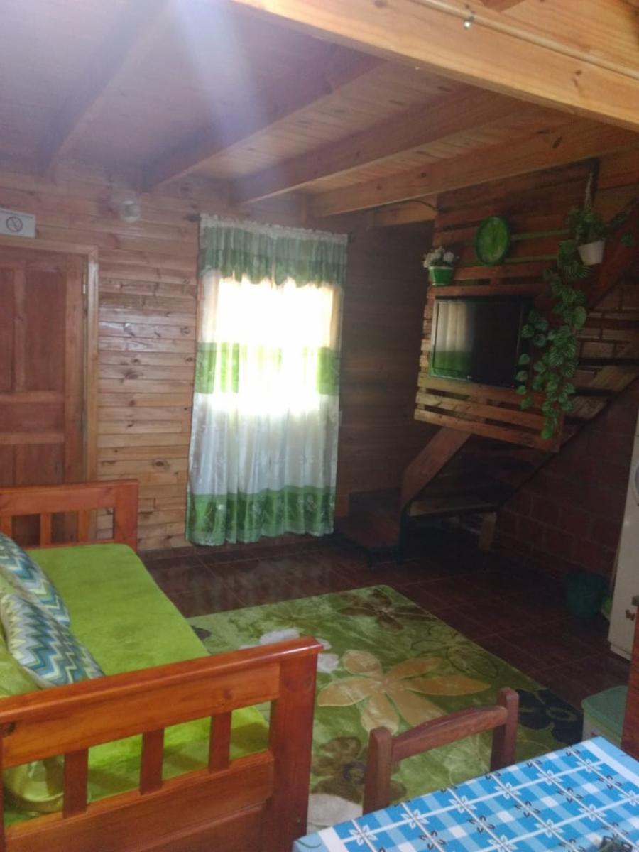 Propiedad con casa y cabañas - 7