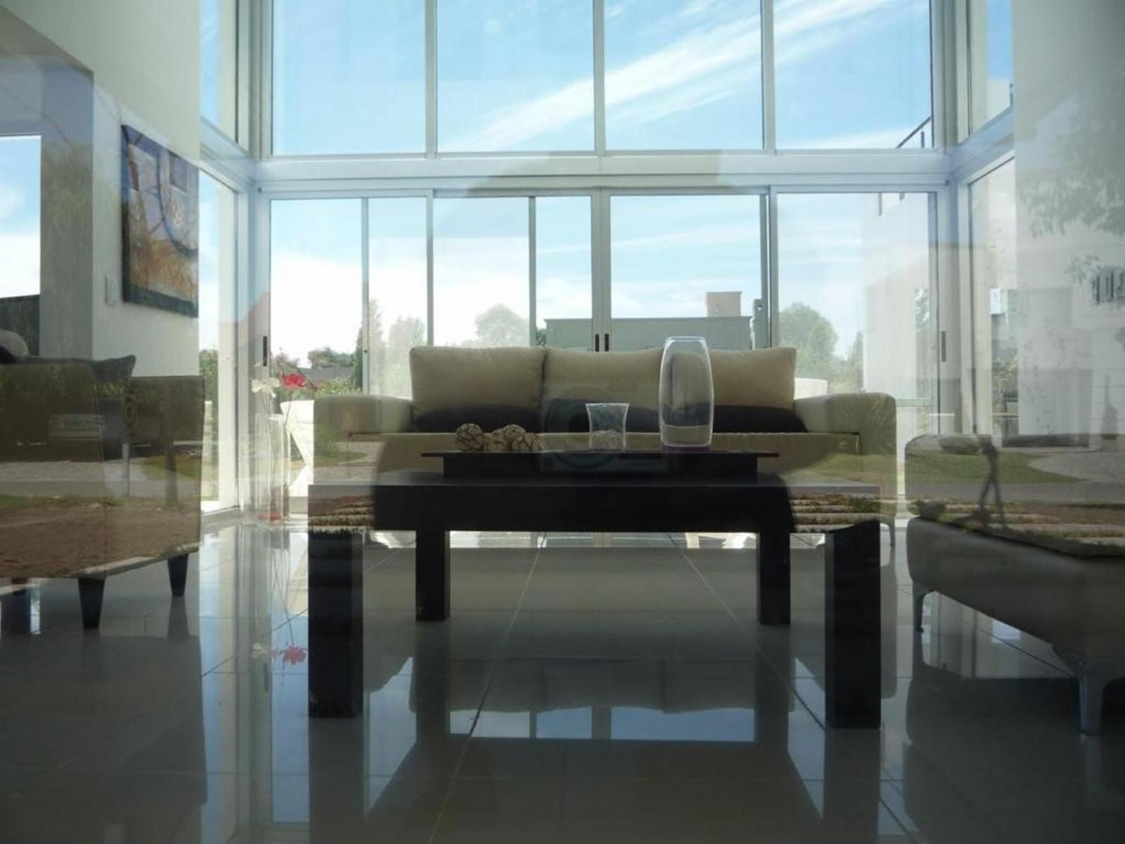 Alquiler Anual de casa 4 amb en Country San Patricio Moreno con Pileta . 1000 m2 Parque - 11