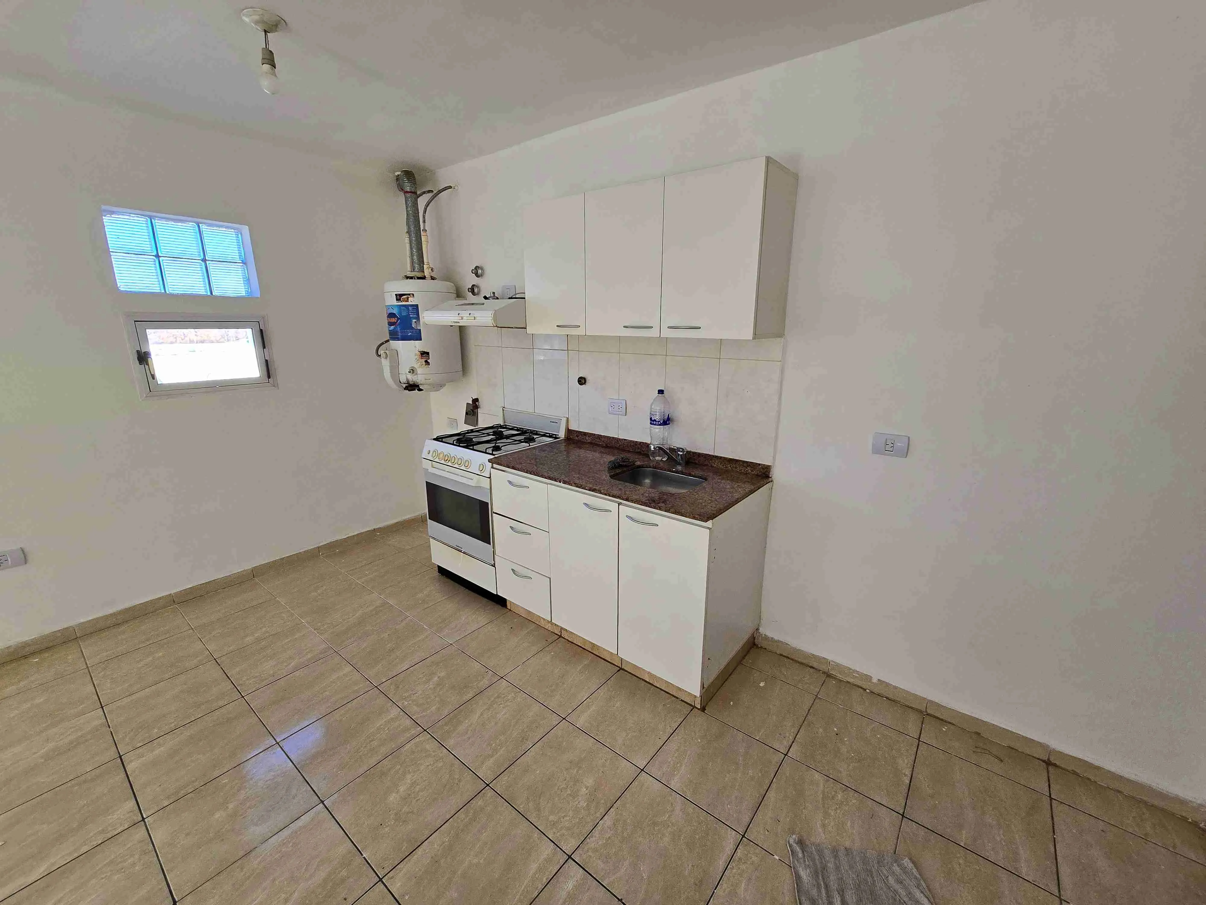 LINDO DEPARTAMENTO EN VENTA EN VILLA CARLOS PAZ, EDIFICIO RÍO DE JANEIRO, 1 DORMITORIO CON PATIO PROPIO. COCHERA - 9