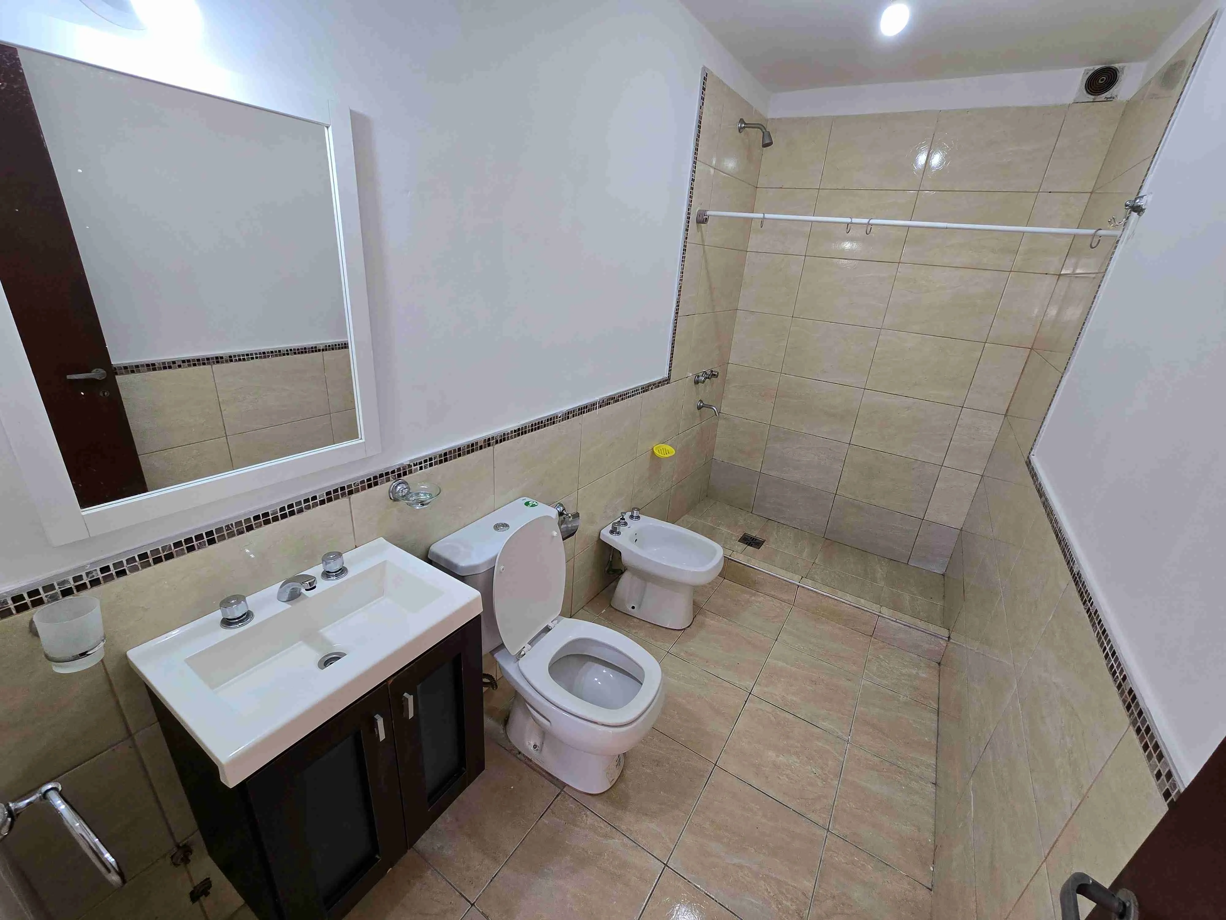 LINDO DEPARTAMENTO EN VENTA EN VILLA CARLOS PAZ, EDIFICIO RÍO DE JANEIRO, 1 DORMITORIO CON PATIO PROPIO. COCHERA - 10